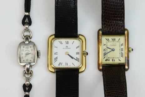 (3) VINTAGE LADIES WATCHES: including a 26x21mm Cartier sterling Tank, quartz movement, dial marked 'Must de Cartier Swiss', case stamped 'Cartier Paris 925 Quartz Argent Plaque OR G 20M Swiss Made 366001 22435', sapphire crown,