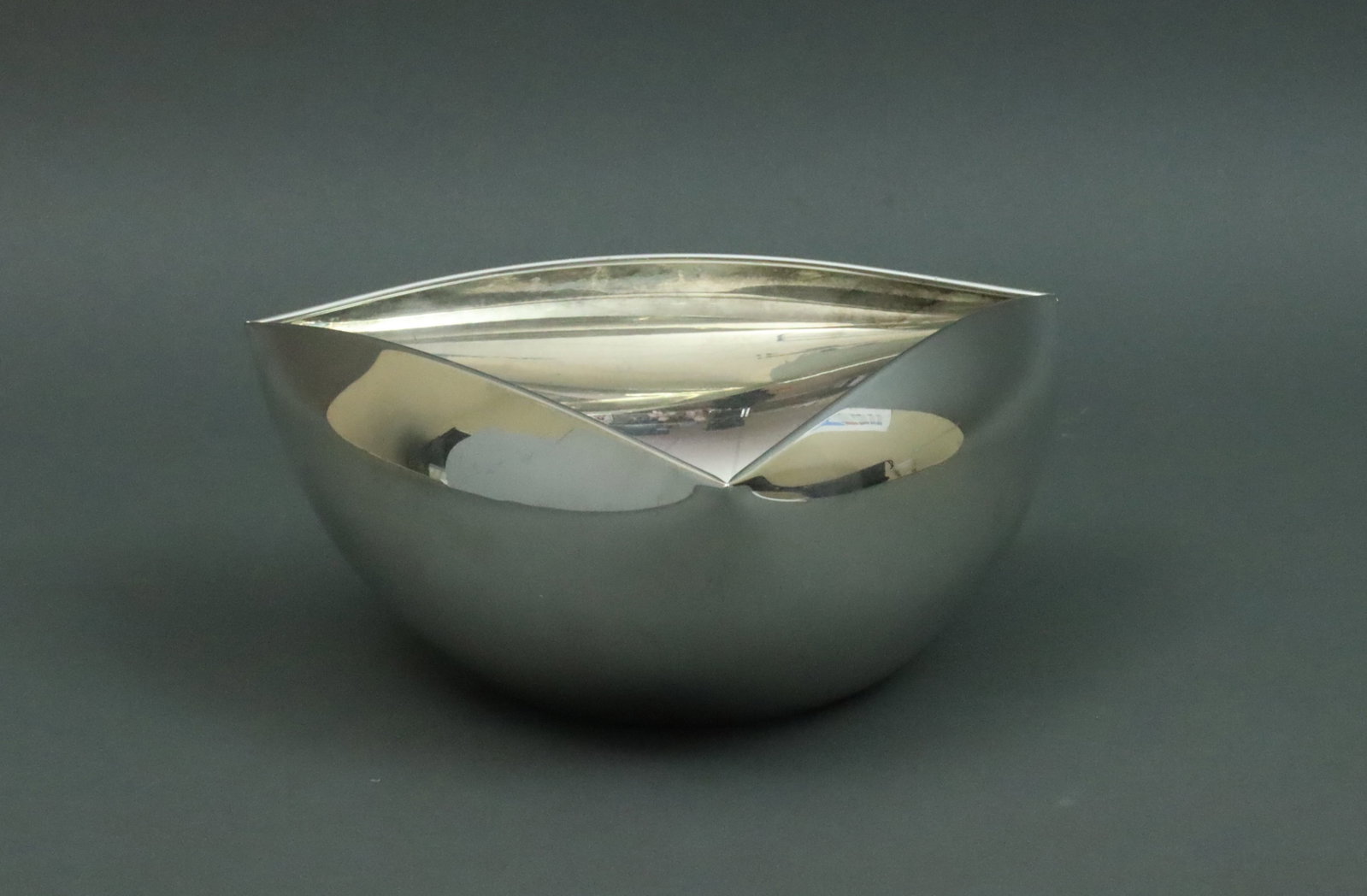 PAMPALONI ITALIAN MODERNIST STERLING BOWL: rolled triangular form, 3.5x7.5in., interior surface scratches, 12.7ozt., Opening Bid $200