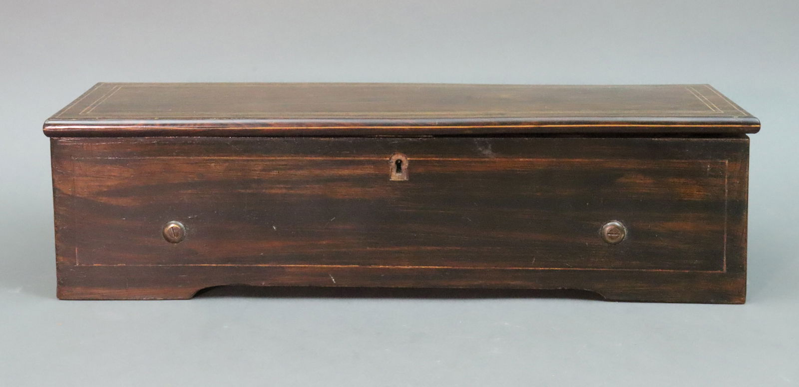 NICOLE FRERES KEY WIND SWISS CYLINDER MUSIC BOX: "Musique de Geneve", 6 tunes, 10.5in. cylinder, #22693, rosewood case, string inlay to case cover and front, key-wind behind hidden left-side door, comb with all teeth, movement and comb stamped Nicol