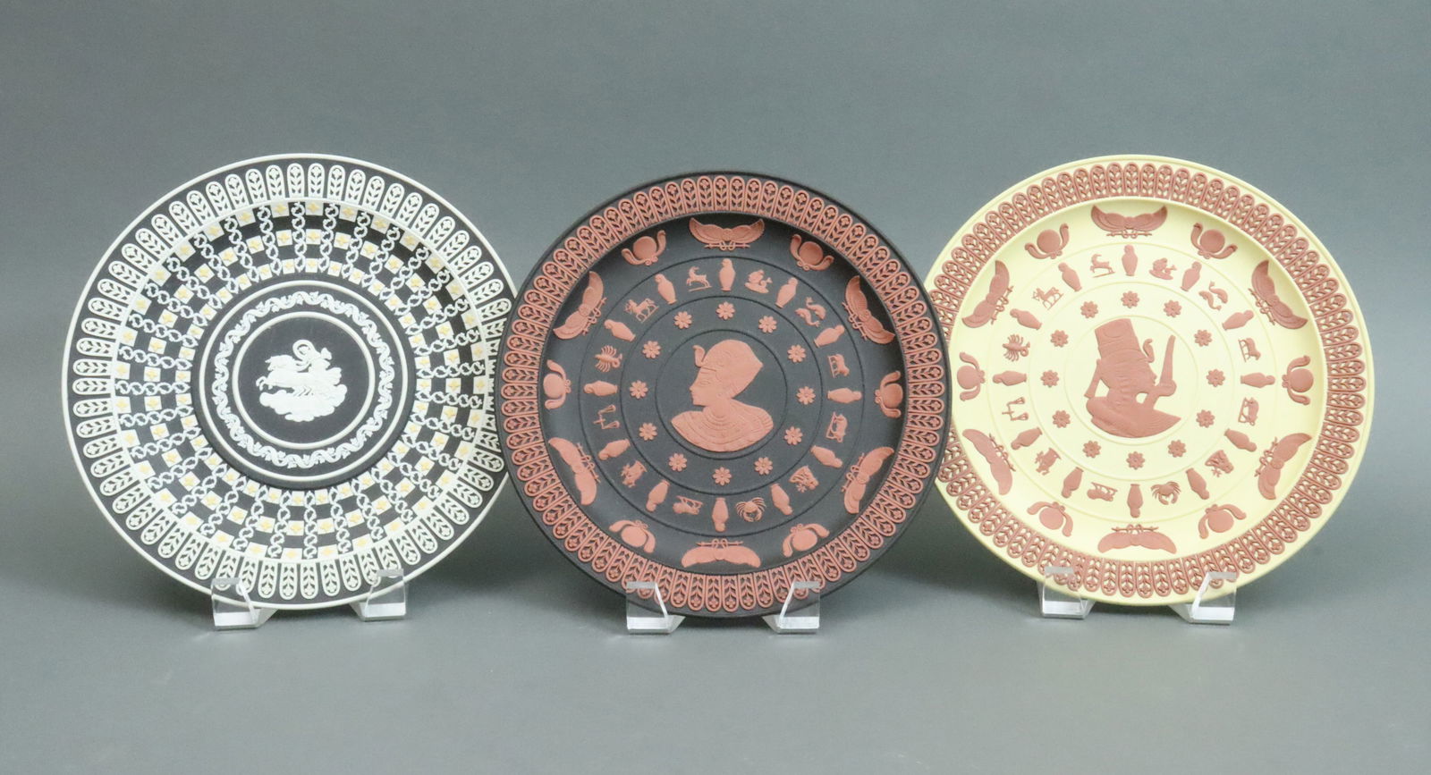 (3) WEDGWOOD LIMITED EDITION JASPERWARE PLATES: 2 from the Egyptian Collection, including Tutankhamum (#281/500), and his queen Ankhesenamun (#238/500), together with a Museum Series piece depicting a cameo of Aurora (#298/500), no condition issues