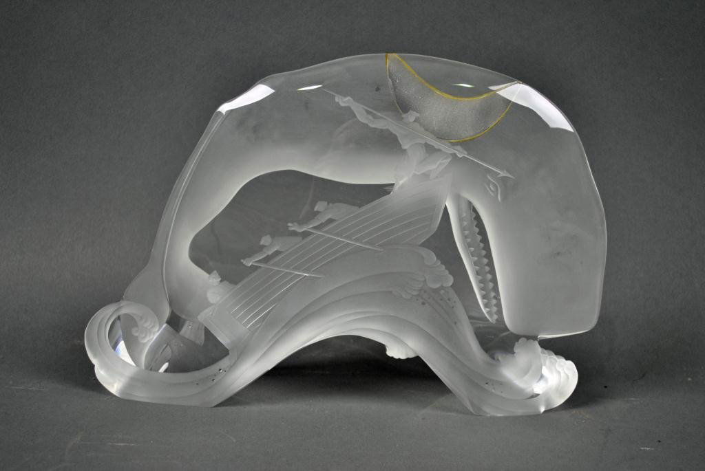 STEUBEN SCULPTURE - MOBY DICK: designed by Donald Pollard and engraved by Sidney Waugh, signed Steuben on base, repair to whale's back made to look like crescent moon, 7.75x11.25in.
