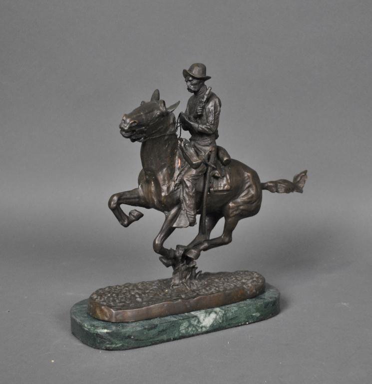 AFTER FREDERIC REMINGTON - TROOPER OF THE PLAINS: bronze sculpture, incised signature, on mottled green marble base, 10x12x4in.