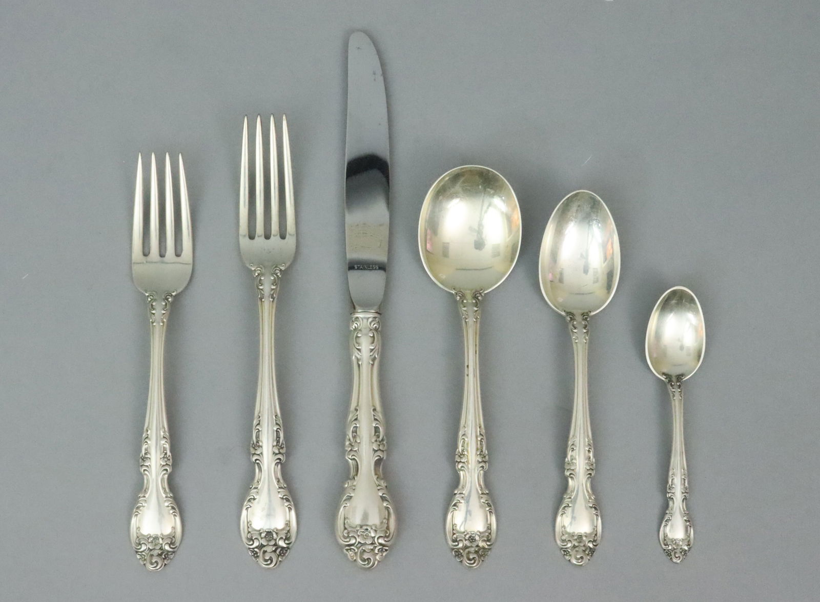 (63) PIECE WALLACE STERLING FLATWARE SERVICE (1 of 2)