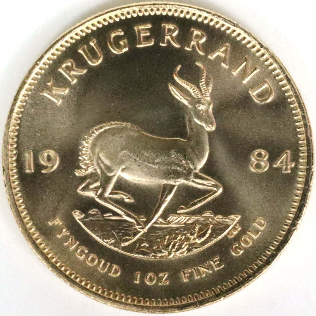 1984 1 OZ. GOLD KRUGERRAND COIN: uncirculated, ungraded, Opening Bid $1600