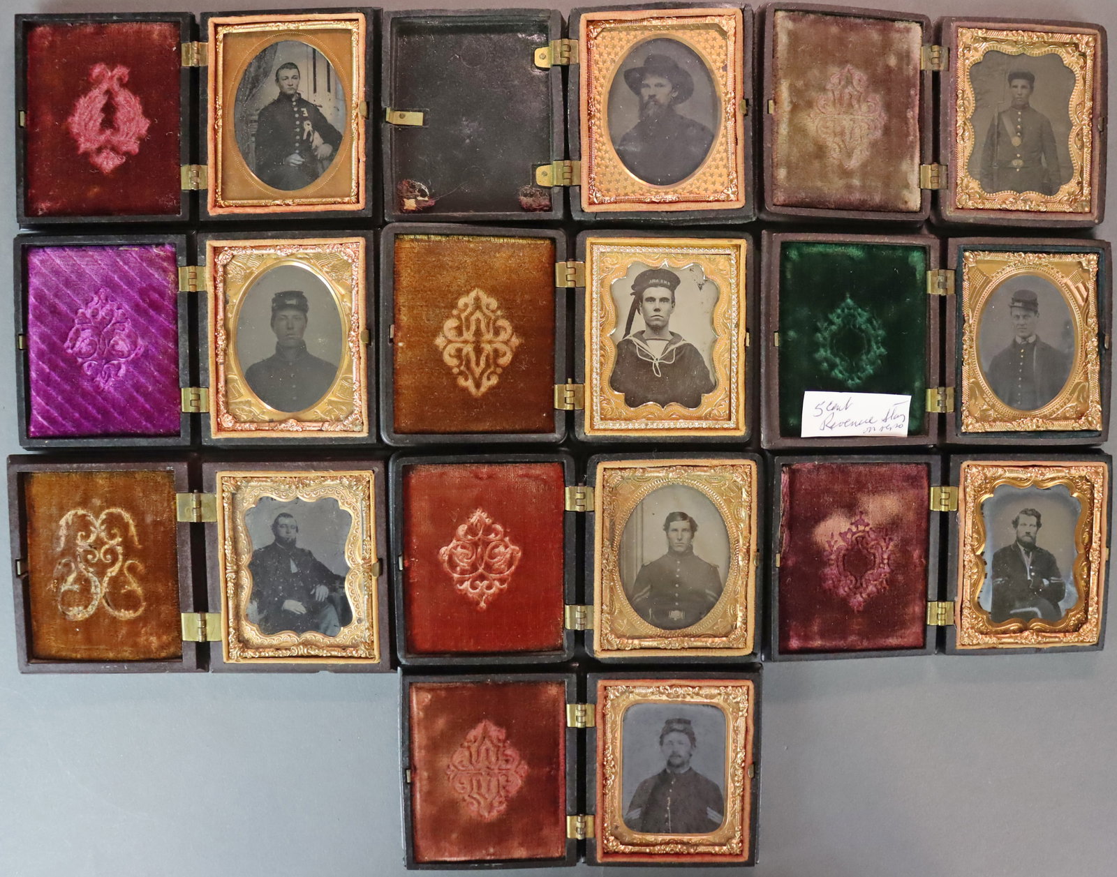 (10) 1/9 PLATE CIVIL WAR SOLDIERS IN UNION CASES: Comprising 7 tintypes and 3 ambrotypes including a British sailor (HMS Asia), all depicting seated portraits but for one in standing position holding a rifle, 4 with button gilt, 3 with scenic backdro