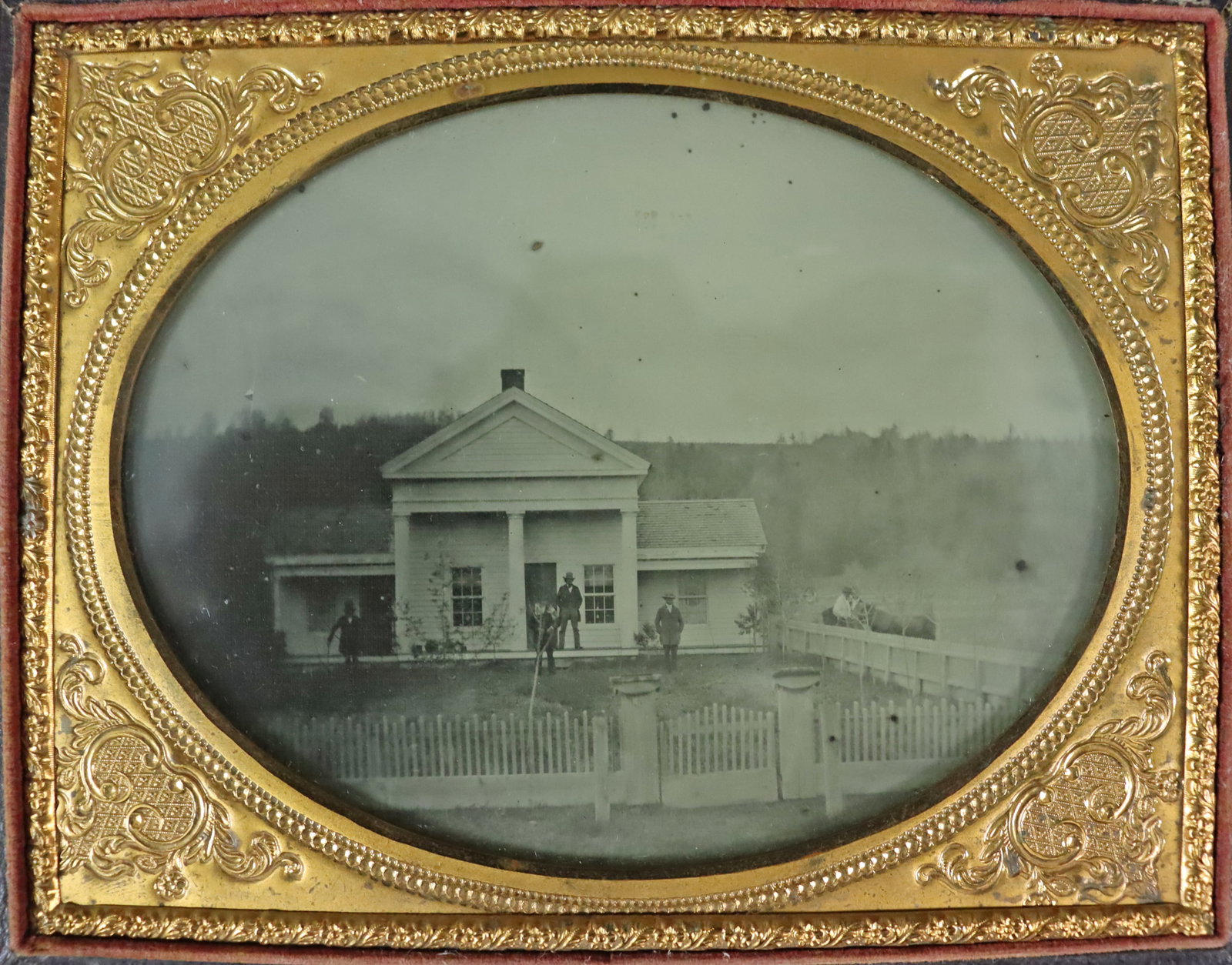 HALF PLATE AMBROTYPE OF IDENTIFIED RESIDENCE: Identified as the "Residence of Chauncy Raynsford, grandfather of Edward E. Raynsford & Mary E. [Raynsford]", a likely later notation states "Milford, Mass, now Chauncy Hall School", the image depicts
