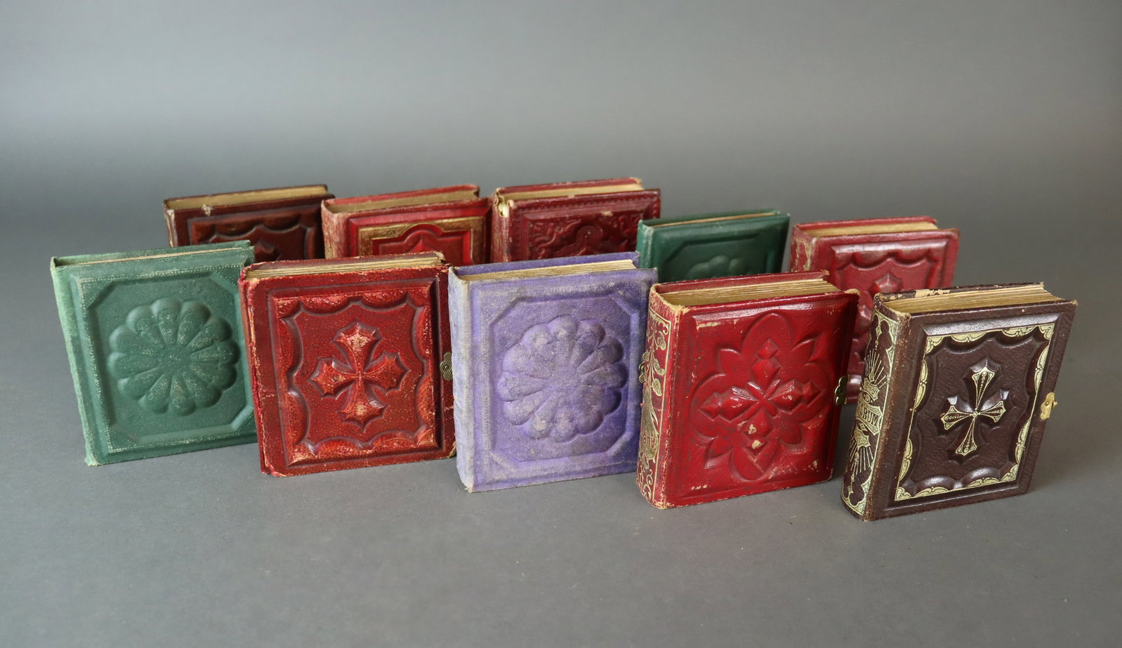 (10) GEM-SIZE TINTYPE ALBUMS - 340+ IMAGES: Comprising 10 albums with approx. 25-45 images per album, one album inscribed in pencil identifying 10+ individuals with surnames Bigelow, Handy, Hull, etc., albums in generally good condition with mi
