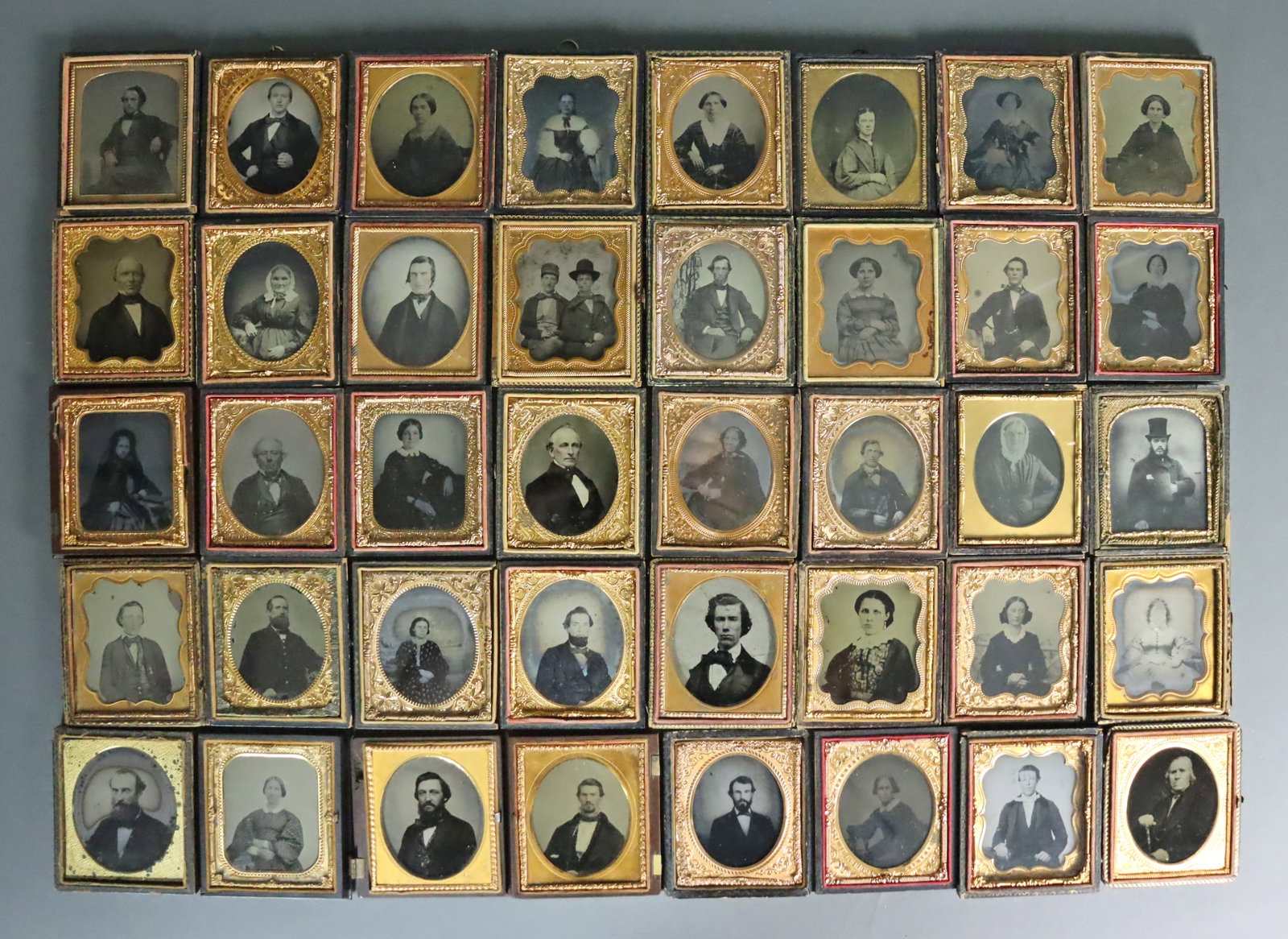 (40) 1/6 PLATE HALF CASED AMBROTYPES - ADULTS: All adult portraits, some with tinting, a couple with gilt. CONDITION: Conditions vary with the wear and tear and typical imperfections of an ambrotype which may include tarnish, spotting, fading, wee