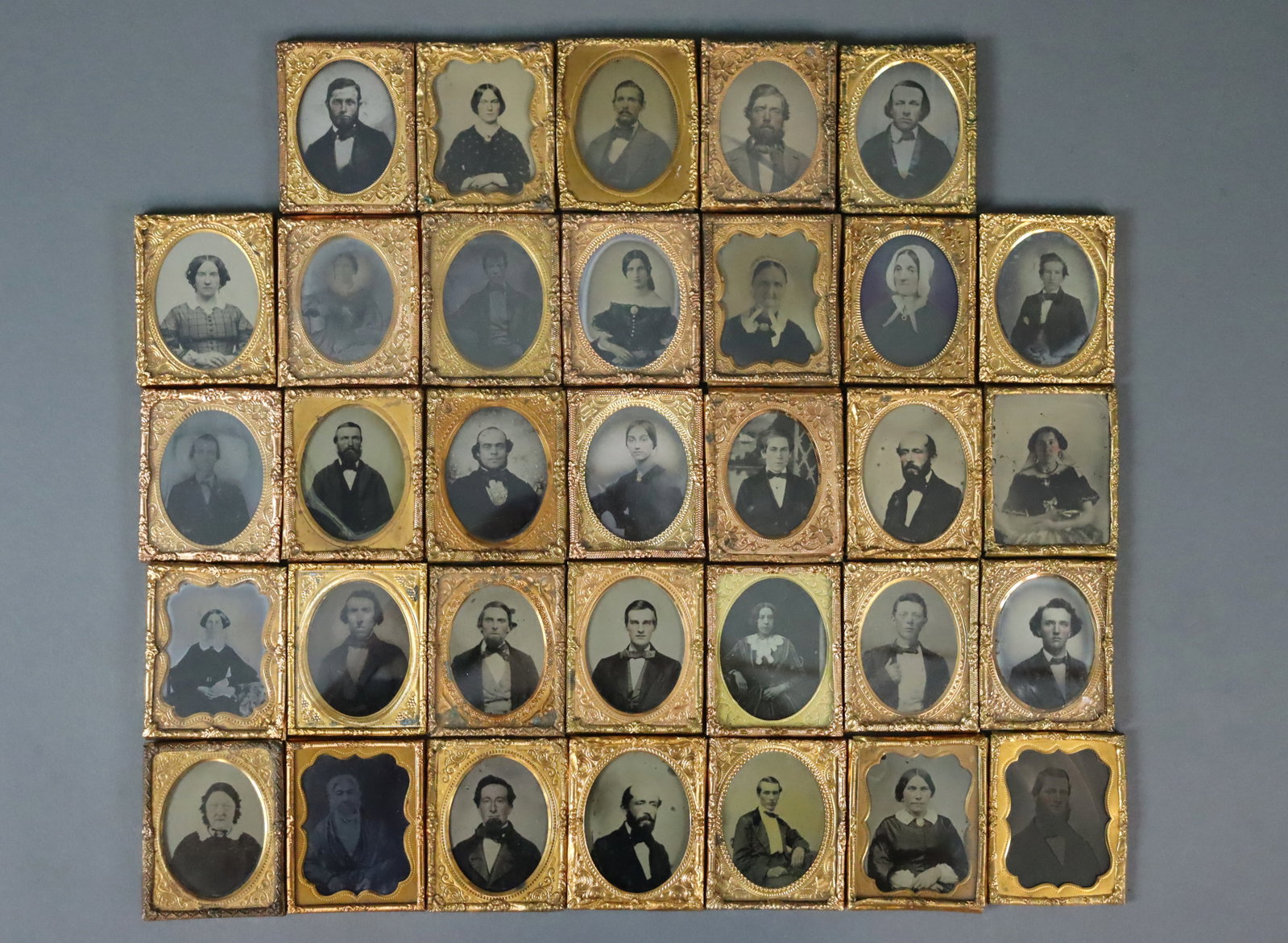 (33) 1/9 PLATE UNCASED AMBROTYPES - ADULTS: All adult portraits, many with tinting, a few with gilt accents. CONDITION: Conditions vary with the wear and tear and typical imperfections of an ambrotype which may include tarnish, spotting, fading