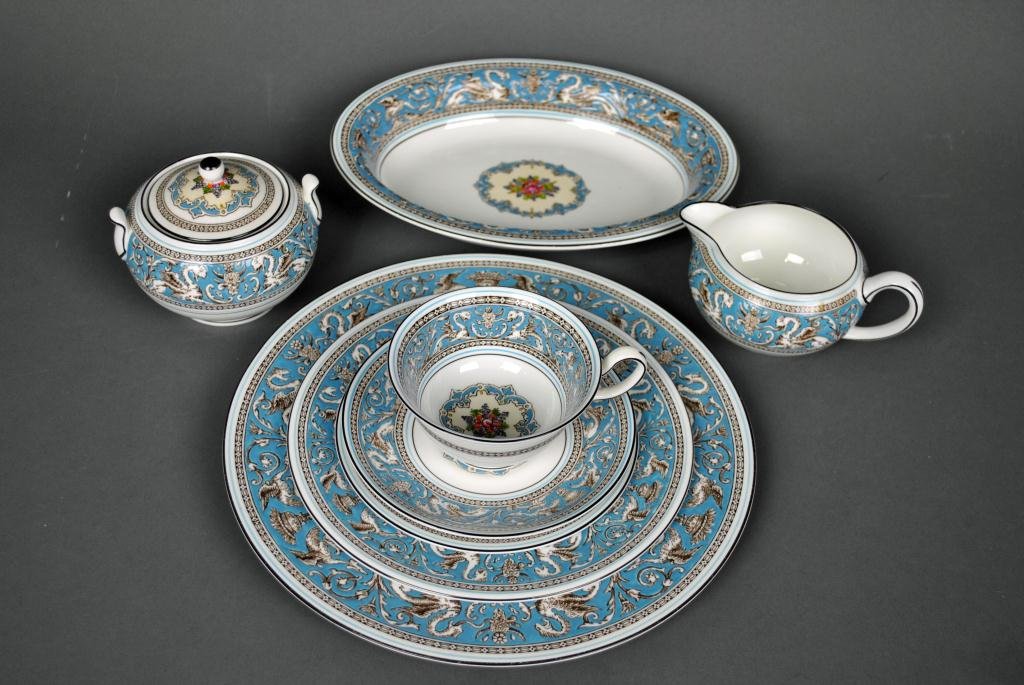 58-PIECE WEDGWOOD FLORENTINE CHINA SERVICE: comprising 8 dinner plates, 9 salad plates, 12 bread and butter plates, 13 cups and saucers, a creamer, covered sugar, and an oval-form open vegetable