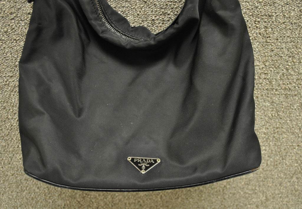 PRADA BLACK NYLON HANDBAG: with interior metal tag reading: Prada Made in Italy, 10x12in.