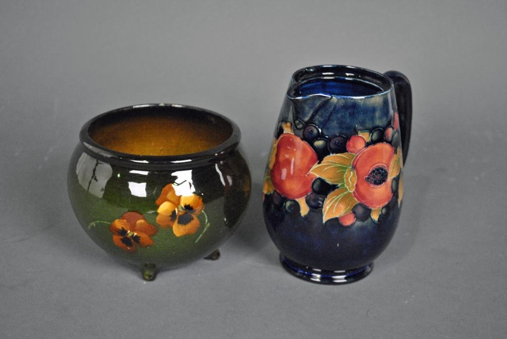 2-PIECE ART POTTERY GROUP - MCCOY AND MOORCROFT: includes a McCoy Loy-Nel-Art footed bowl, and a Moorcroft pitcher (lacking lid), tallest 6in.