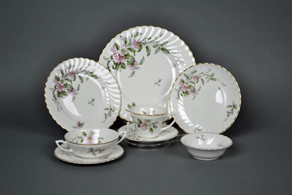 99-PIECE SYRACUSE ‘APPLE BLOSSOM’ CHINA SERVICE: including 12 each dinner, salad, lunch and bread & butter plates, berry bowls and cream soups, 11 saucers, 10 tea cups, creamer, sugar, open vegetable, gravy boat, and 2 platters 14-16", minor knife s
