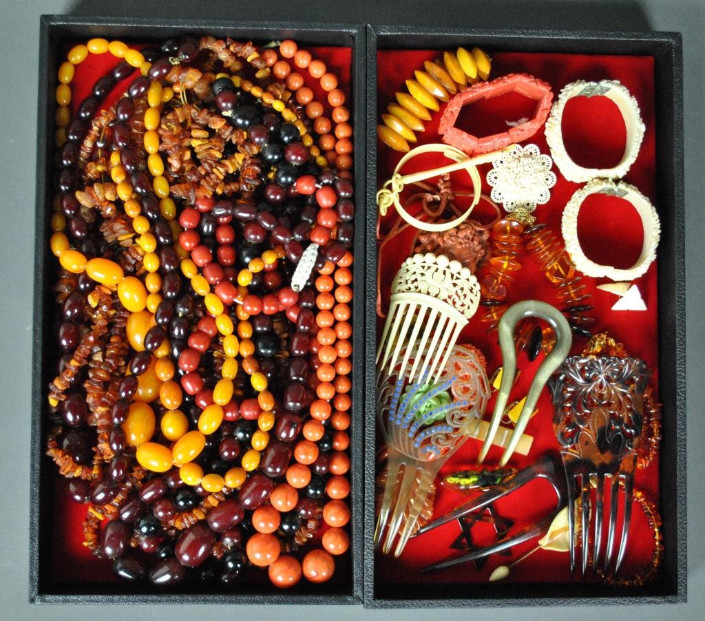 40-PIECE AMBER, AMBER-STYLE & PLASTIC JEWELRY: including beaded necklaces, bracelets, pins, earrings, hair ornaments, Bakelite or Bakelite-style pieces, etc. (some in need of restringing)