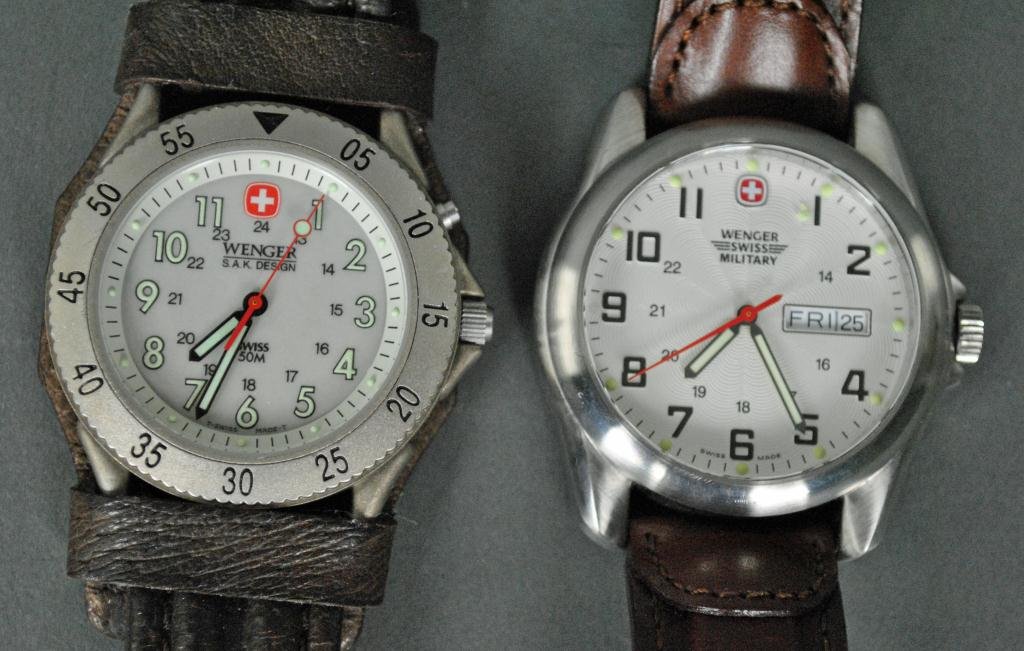 TWO WENGER SWISS WRISTWATCHES: one dial marked Military, the other S.A.K. Design, each with leather band, 9-9.5in.