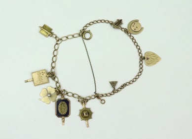 14K CHARM BRACELET WITH (9) CHARMS - MOST SORORITY