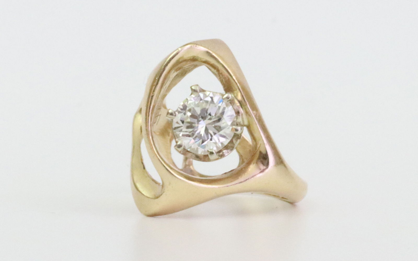 14K DIAMOND COCKTAIL RING, 1.10CT: set with a round brilliant cut natural diamond approx. 1.13ct, 6.6x6.6x4.1mm (in our opinion: G-H color, VS clarity, however not guaranteed), diamond purchased c.1968, mounted in a custom yellow gold