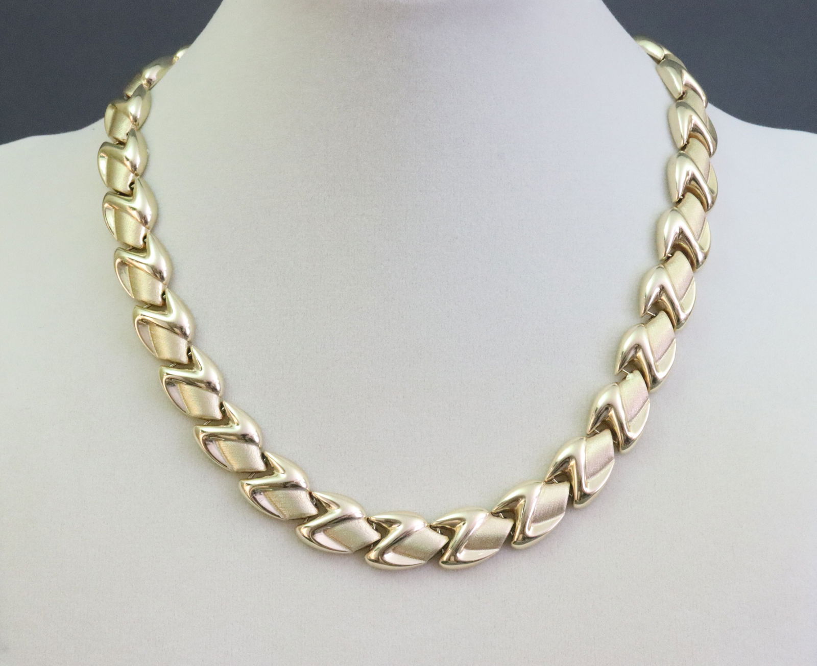 ITALIAN 14K FOXTAIL NECKLACE: in brushed and polished gold, stamped '14K Italy', width 12mm, length 16.5in., safety catch, 41.2gms., Opening Bid $2500