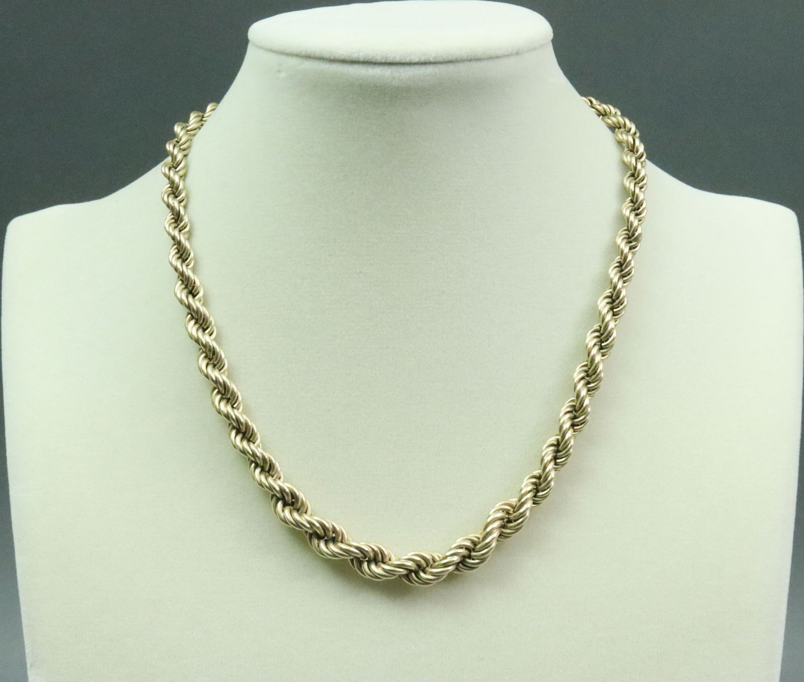 14K GRADUATED ROPE CHAIN NECKLACE: stamped 14K, width 8mm across center, length 16in., 22.3gms., Opening Bid $1200