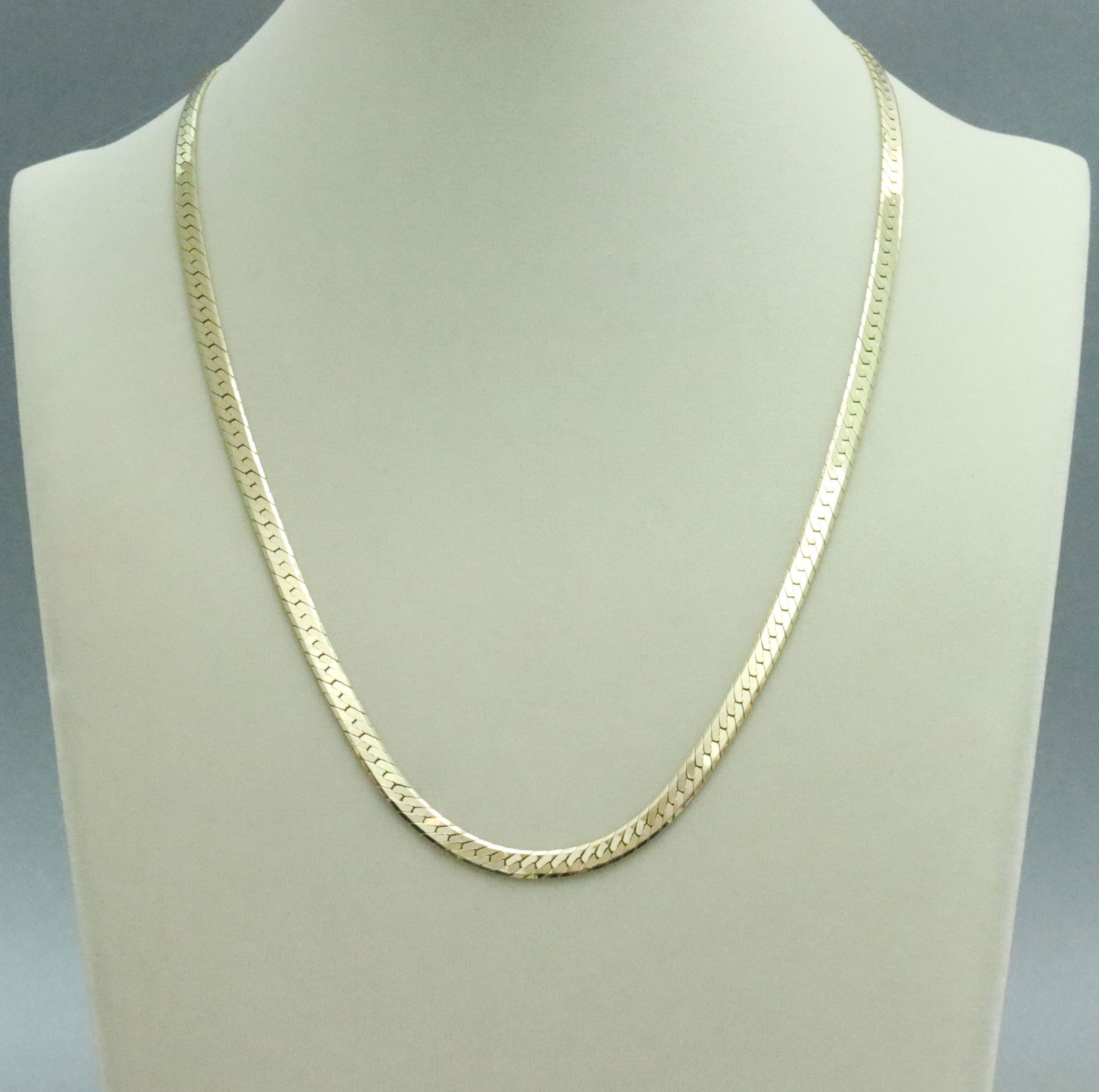 14K HERRINGBONE NECKLACE: stamped 14K, 20.5in., 20.1gms., Opening Bid $1200