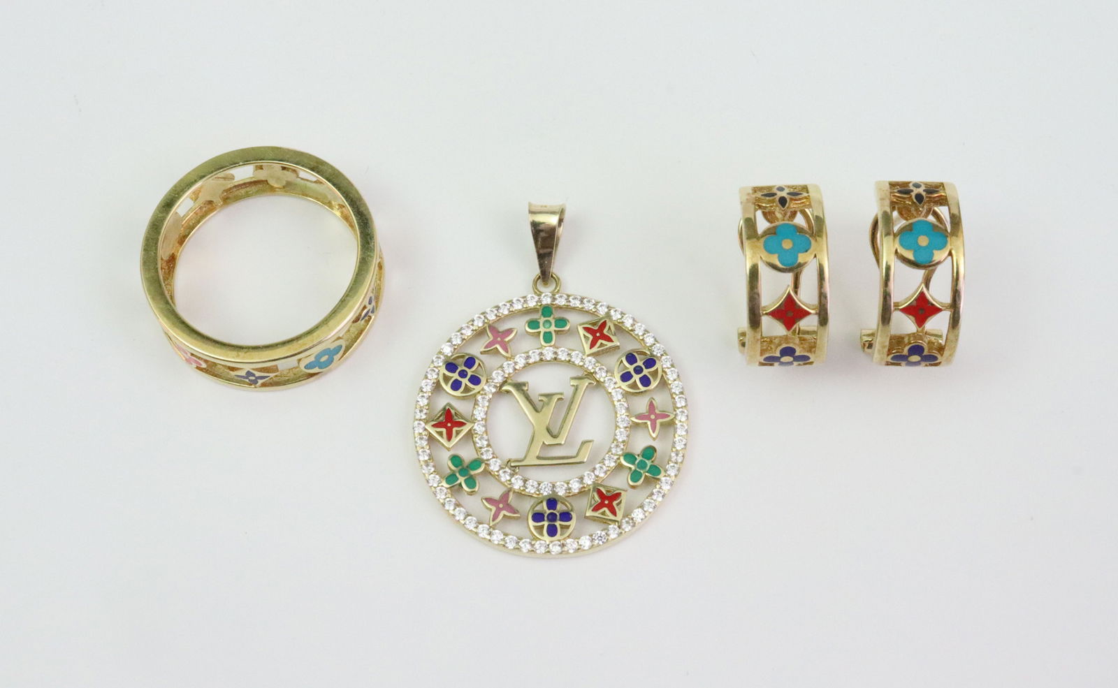 (3) PIECE 18K LOUIS VUITTON REPLICA JEWELRY GROUP: after the Idylle Blossom design, the filigree enameled group includes a 23mm pendant with white gemstone borders, a size 6 band, height 7mm, and a pair of 15mm huggie earrings, all stamped for 18K,