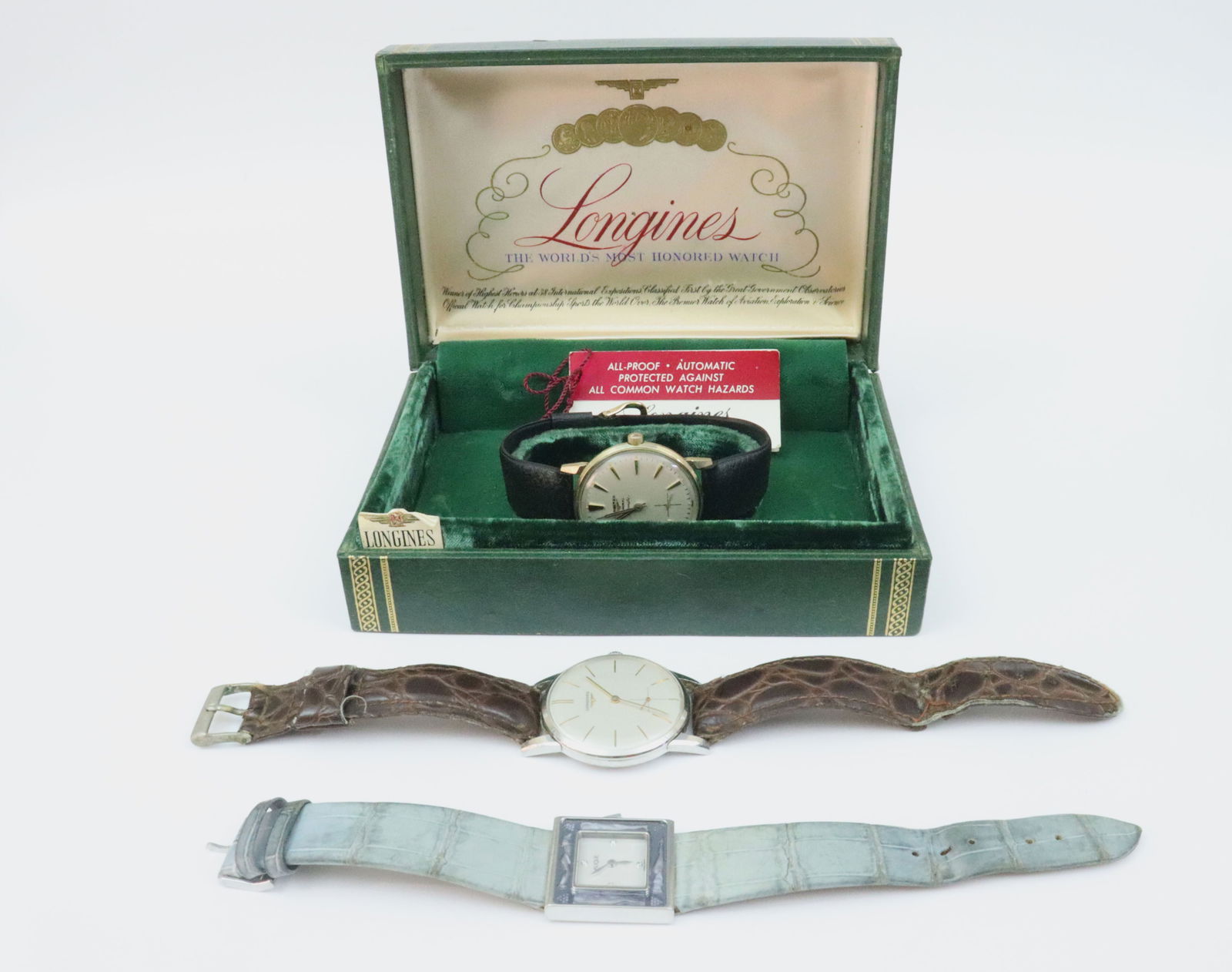 (3) VINTAGE WRISTWATCHES - LONGINES & LALIQUE: includes a Longines 34mm automatic 'Admiral 1260' in 10K gold filled case, very serviceable English black leather strap, runs a bit fast, a Longines 34mm manual wind, stainless case, brown leather str
