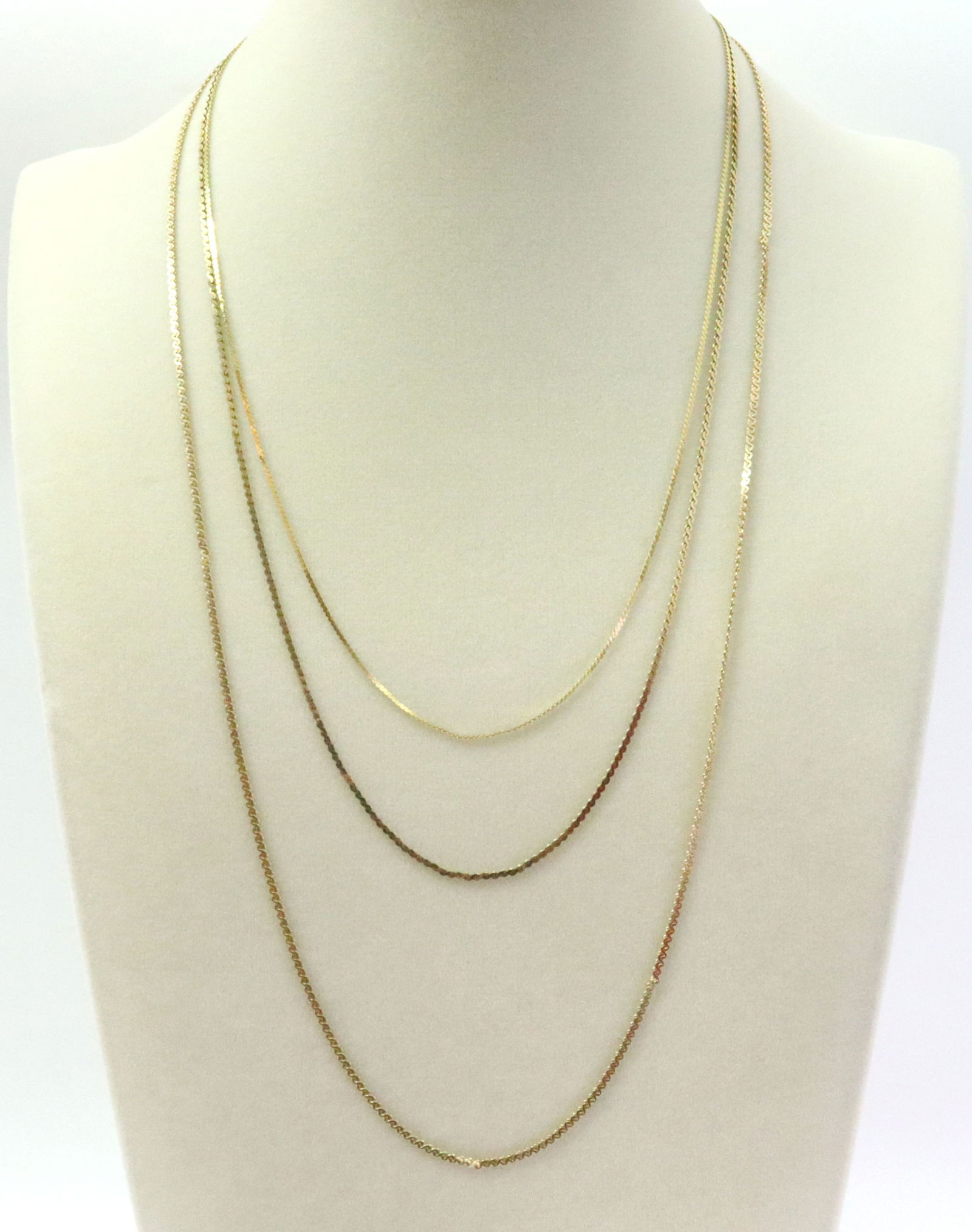 (3) 14K SERPENTINE NECKCHAINS: including a 24", a 20", and an 18" marked Italy, all stamped or tested 14K, gross weight 10.5gms., Opening Bid $500