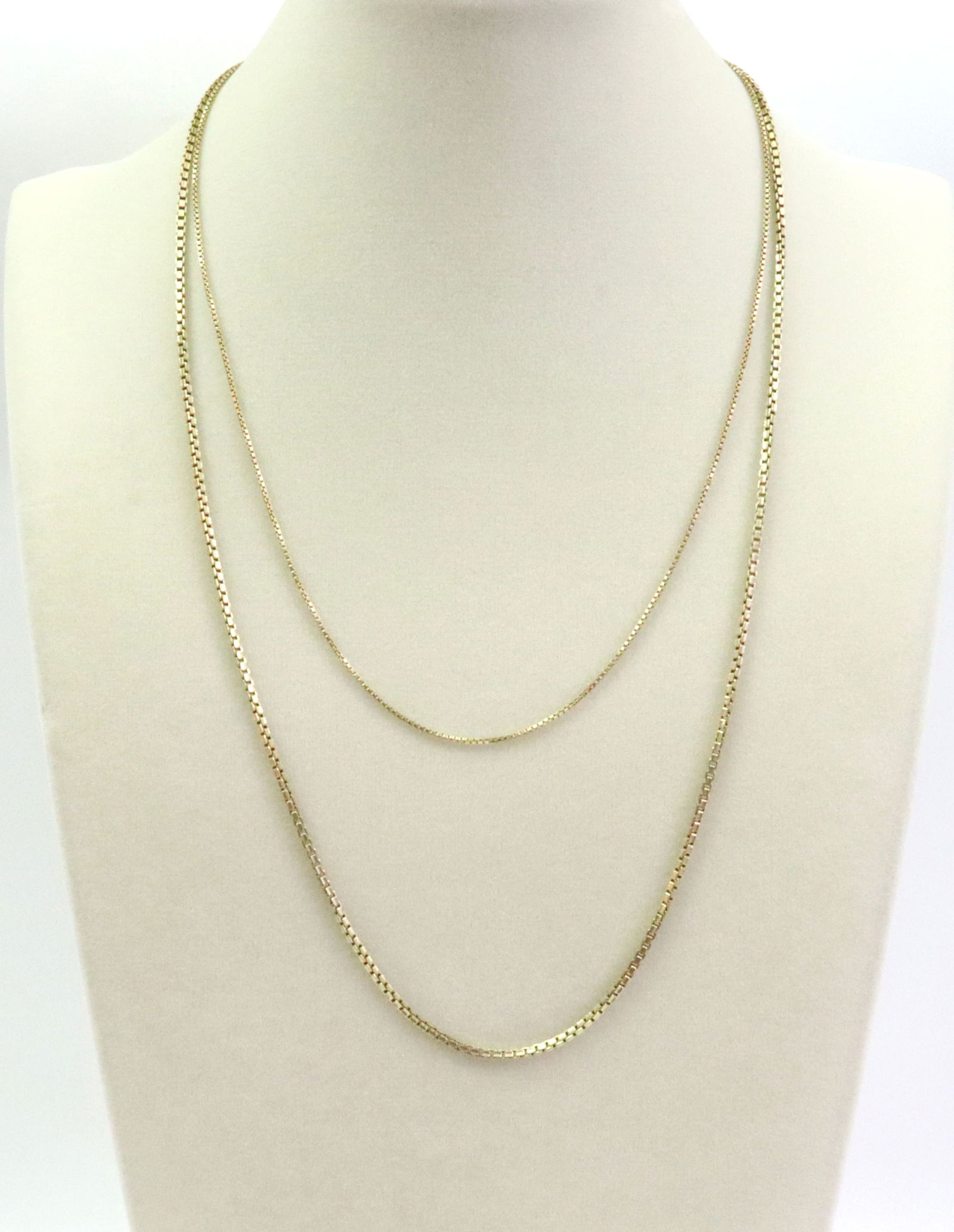 (2) 14K BOX LINK NECKCHAINS: including a 24" marked Italy, and a 15.5" with Italian hallmark, each stamped 14K, gross weight 10.7gms., Opening Bid $500