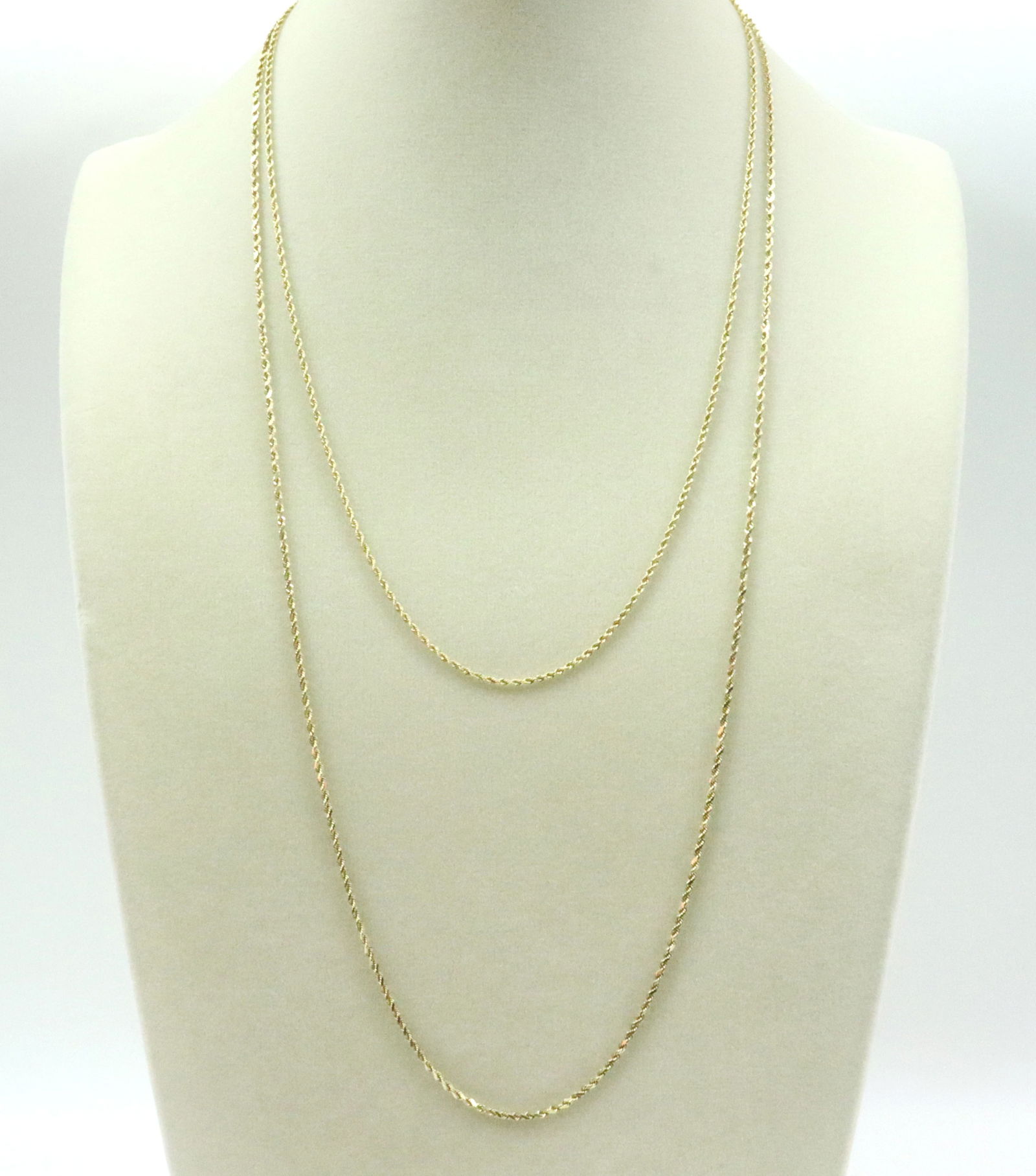 (2) 14K ROPE LINK NECKCHAINS: including a 24in. and an 18in., each with safety catch, both stamped 14K, gross weight 8.4gms., Opening Bid $400