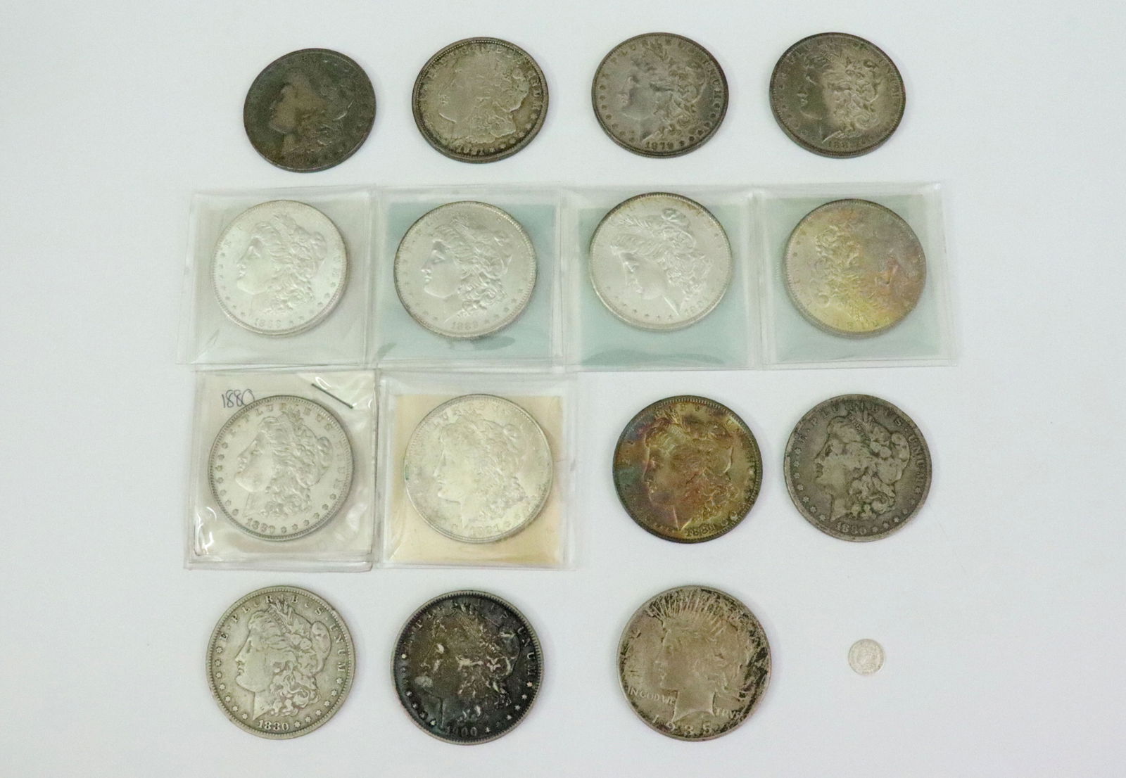 (15) US SILVER DOLLAR COINS - MOST MORGANS: Morgan's include 1879, (3)1880, 1881 (BU), 1881-O (BU), 1882-O, 1888 (BU), 1889 (BU), 1897-O, 1900-O, 1901-O (BU), 1921 (BU), and a 1921-D, grades are not guaranteed, but in our opinion, and a 1935