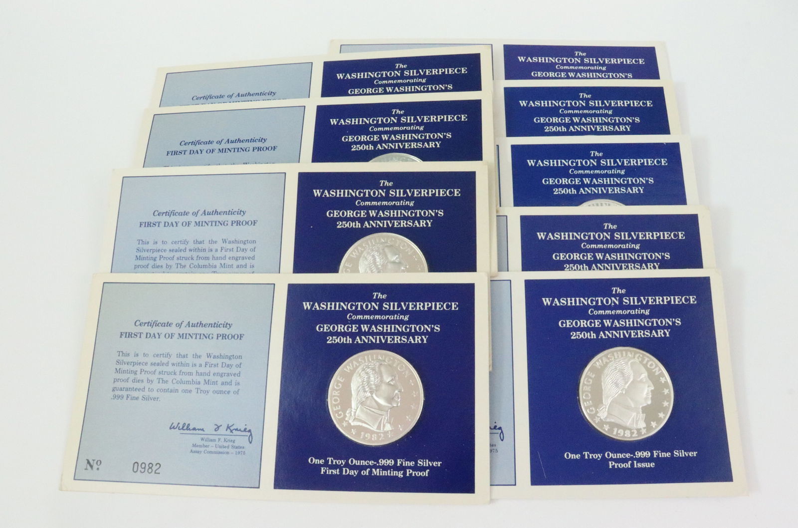 (9) COLUMBIA MINT 1 TROY OZ .999 SILVER ROUNDS: all proof 1982, minted in commemoration of the birth of our Founding Father, his 250th Anniversary, 4 of the 9 rounds include numbered cards indicating they were produced on the first day of minting,