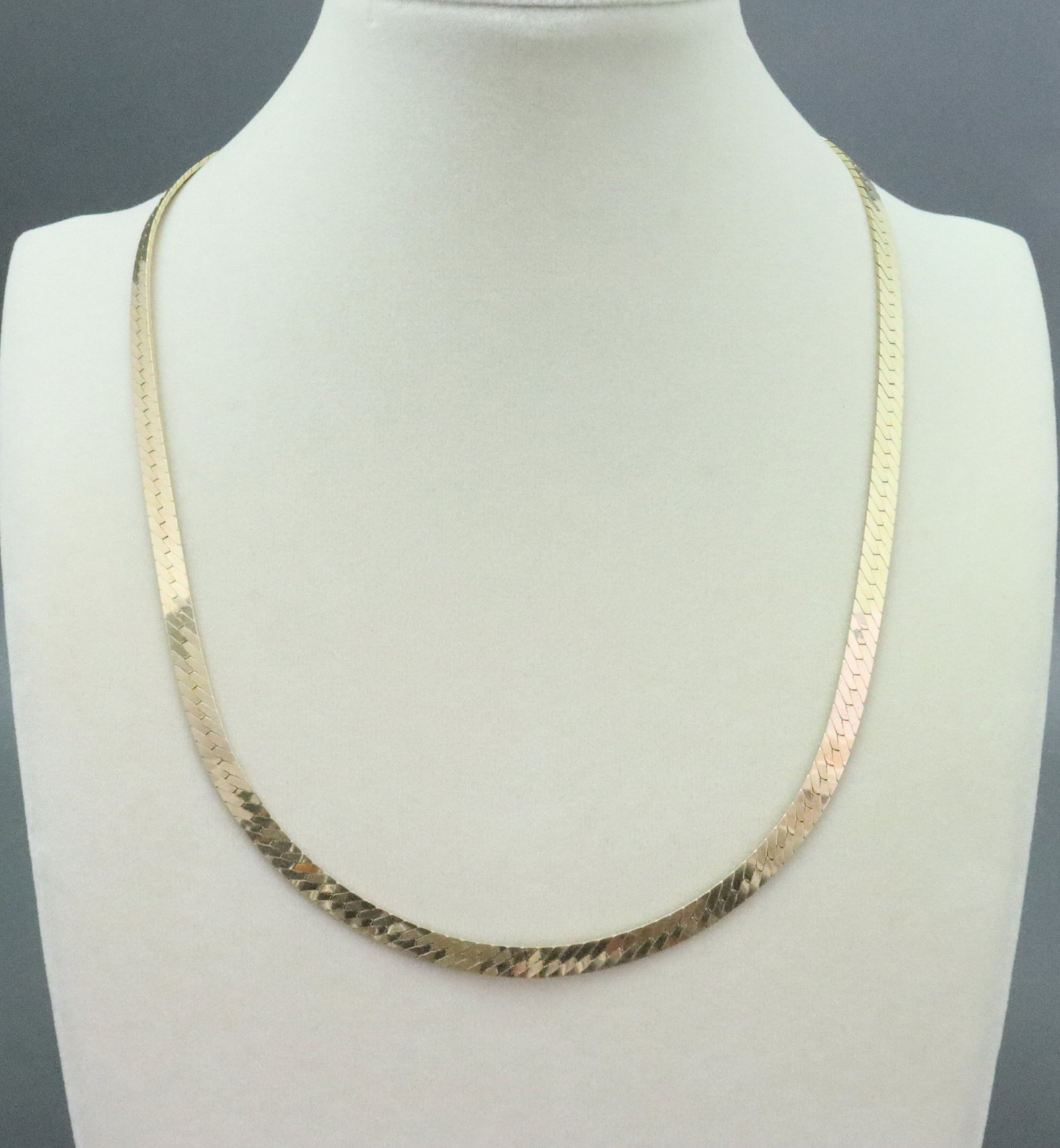 14K HERRINGBONE NECKLACE: in yellow gold, stamped 14K, 20in., 26.3gms., Opening Bid $1400