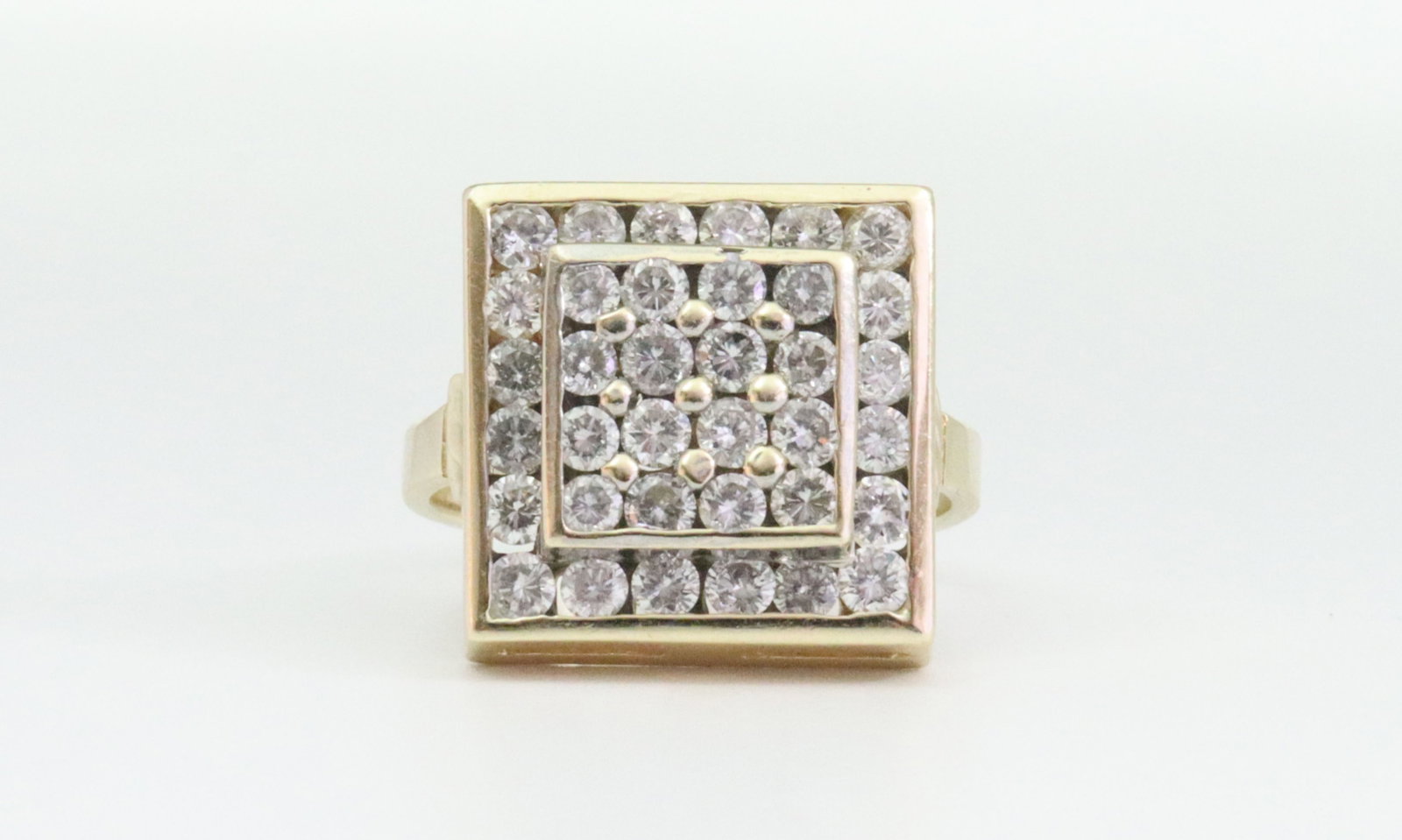 14K SQUARE TOP DIAMOND CLUSTER RING: set with 36 round pave and channel-set natural diamonds approx. 1.80ctw, overall ring head 16x16mm (some unrefined finishing to backside with some visible residue), in yellow gold, stamped 14K, and