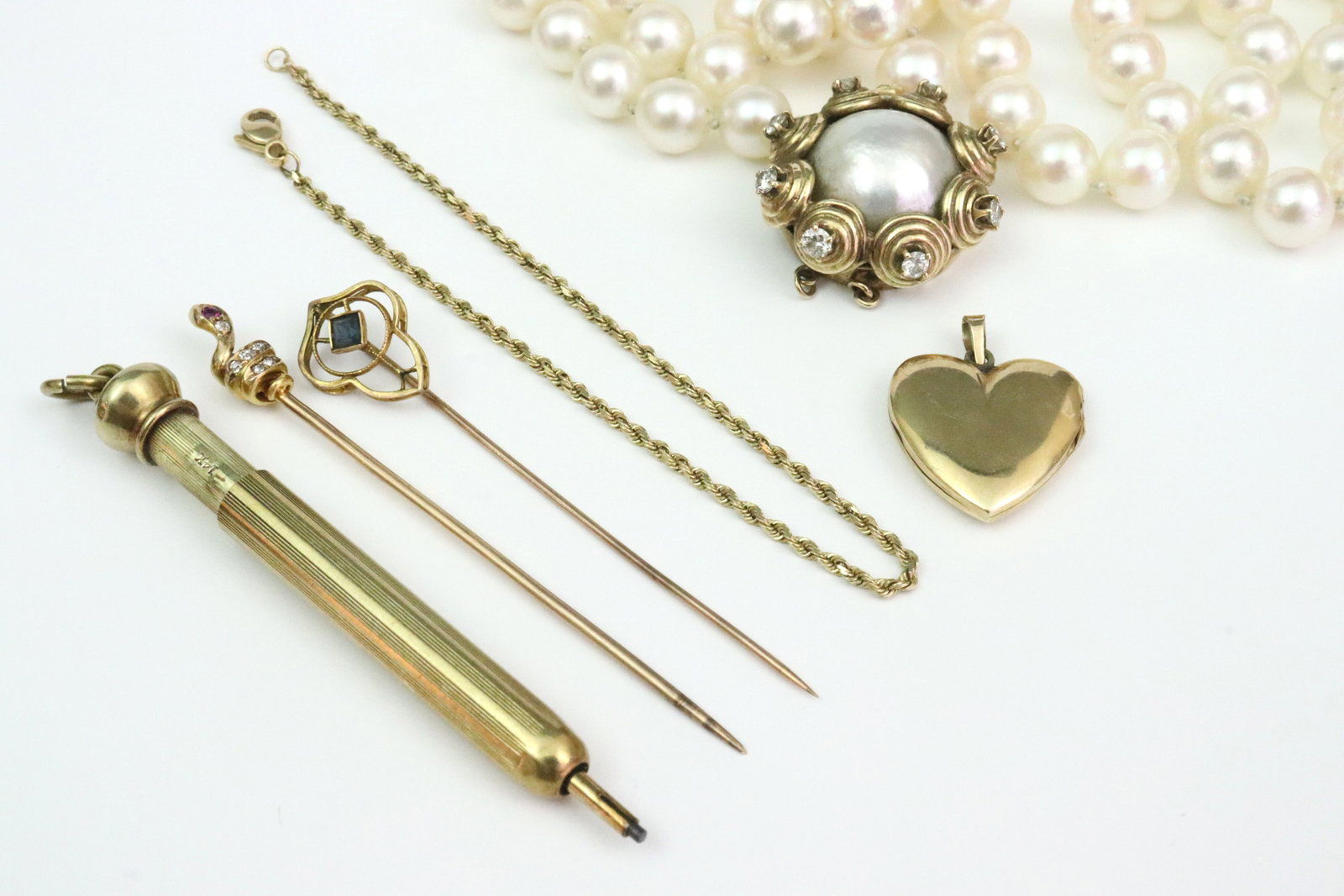 (6) PIECE GOLD JEWELRY GROUP, MOST 14K: 14K includes a 2" mechanical pencil pendant, an engraved heart locket charm, a 7" rope link bracelet, an as-is 7.5mm cultured pearl necklace (needs restringing), with gold mabe pearl clasp set with 8 