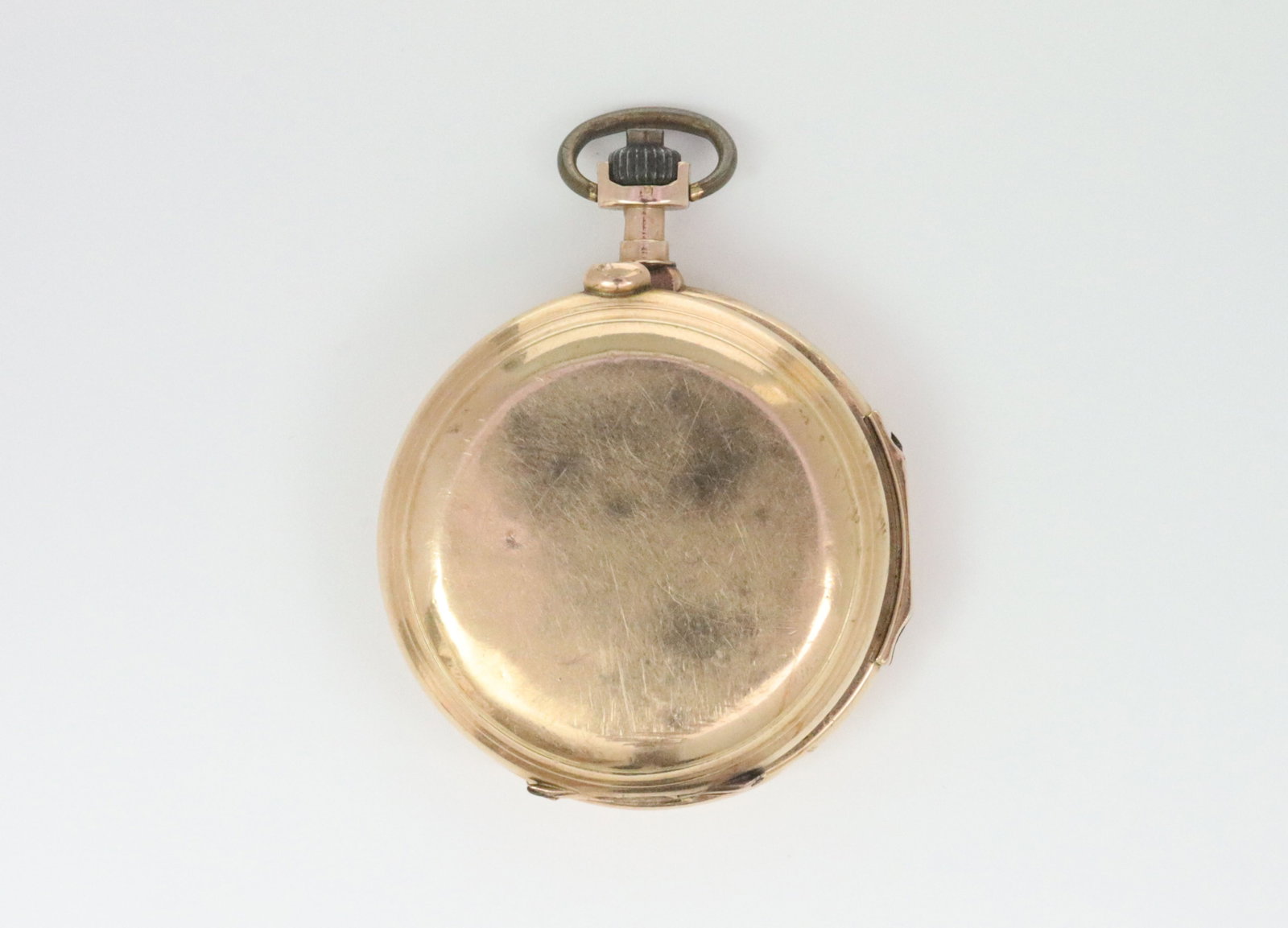 14K SWISS POCKET WATCH: c.1880, 37mm, undecorated hunter case, unmarked porcelain dial with seconds subdial and black minute numerals (missing hands and crystal, porcelain with minor edge roughness), caseback interior stampe