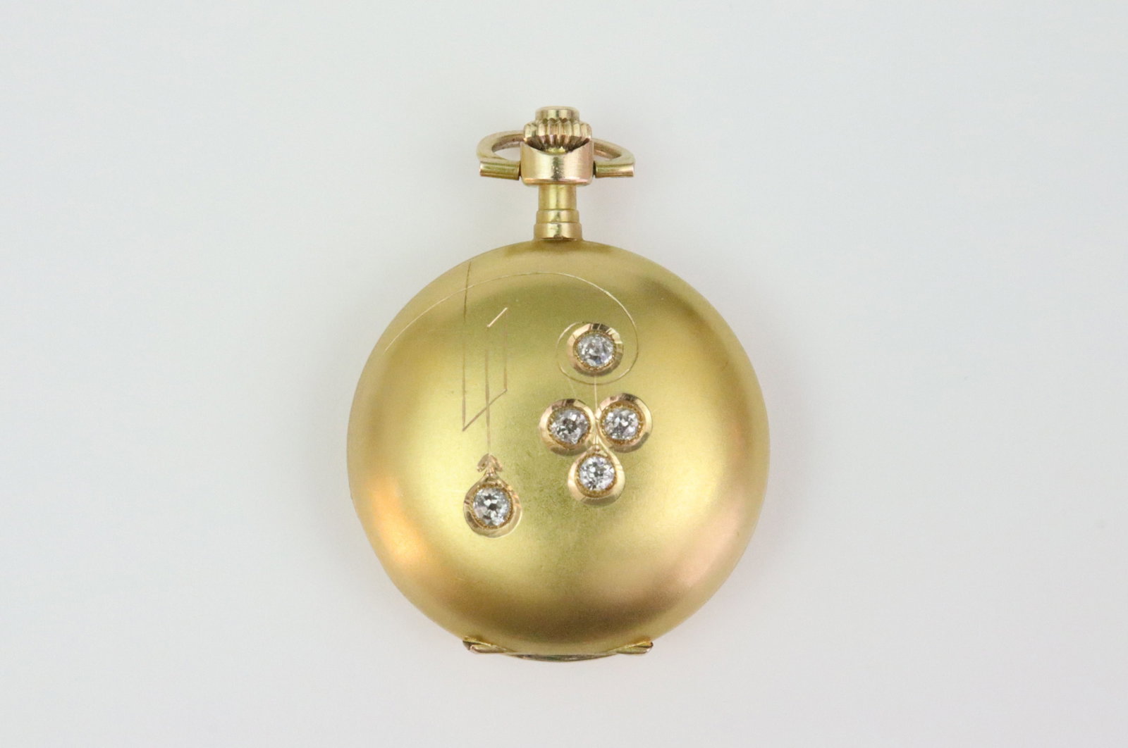 LADIES SERAPH 14K DIAMOND POCKET WATCH: 30mm, incised hunter case bezel-set with 5 round natural diamonds approx. 0.25ctw, dial marked Seraph, covers and cuvette stamped 14K, squirrel punch, serial number 22031, Swiss movement, the watch is