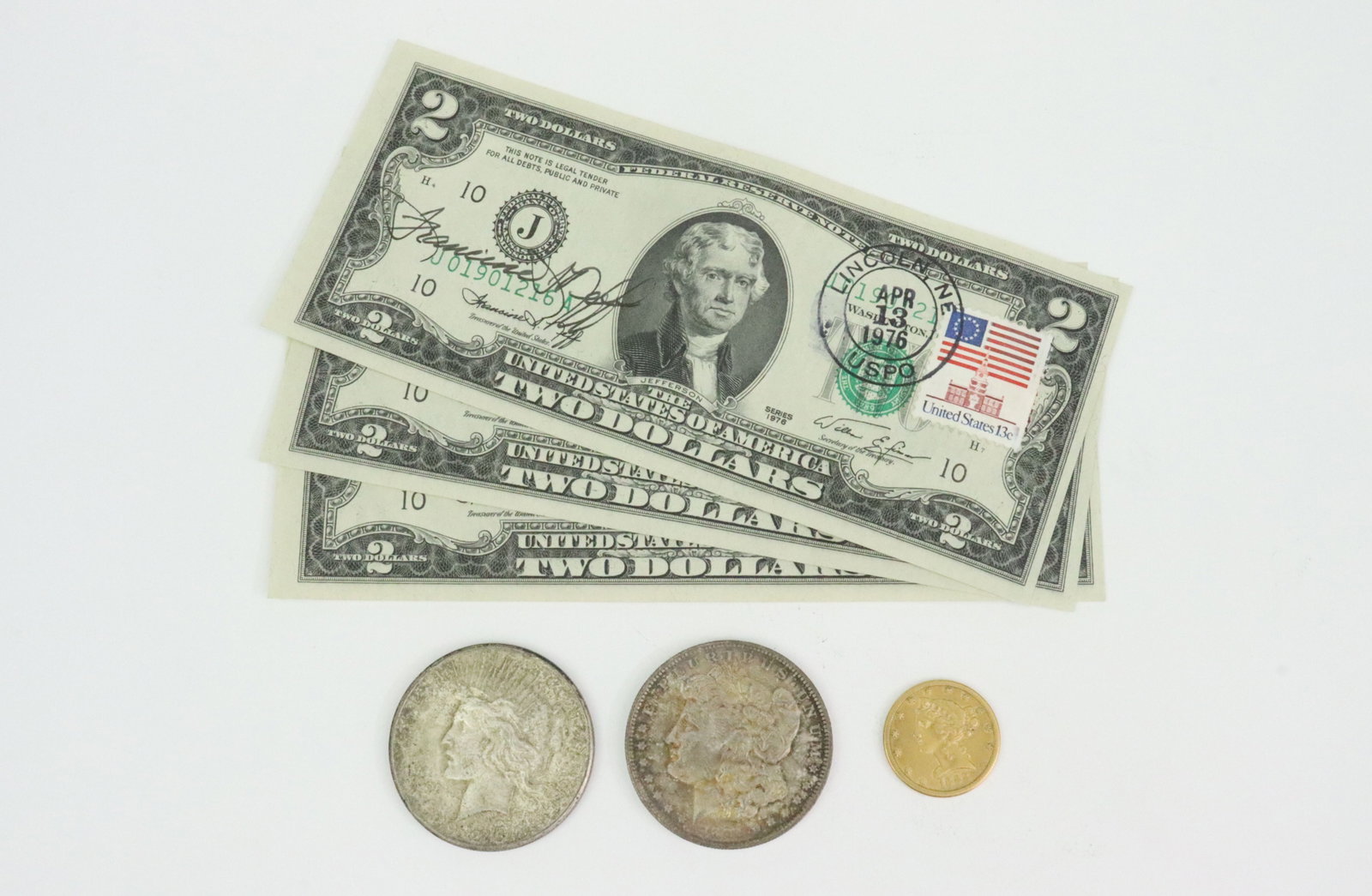 (6) PIECE US COINS & CURRENCY GROUP INCL. $5 GOLD: includes an 1888-S Half Eagle $5 gold coin, 8.29gms., a 1926-S Peace silver dollar, an 1884-O Morgan silver dollar, and 3 Series 1976 $2 Federal Reserve Notes signed in ink by Francine I. Neff, 35th T