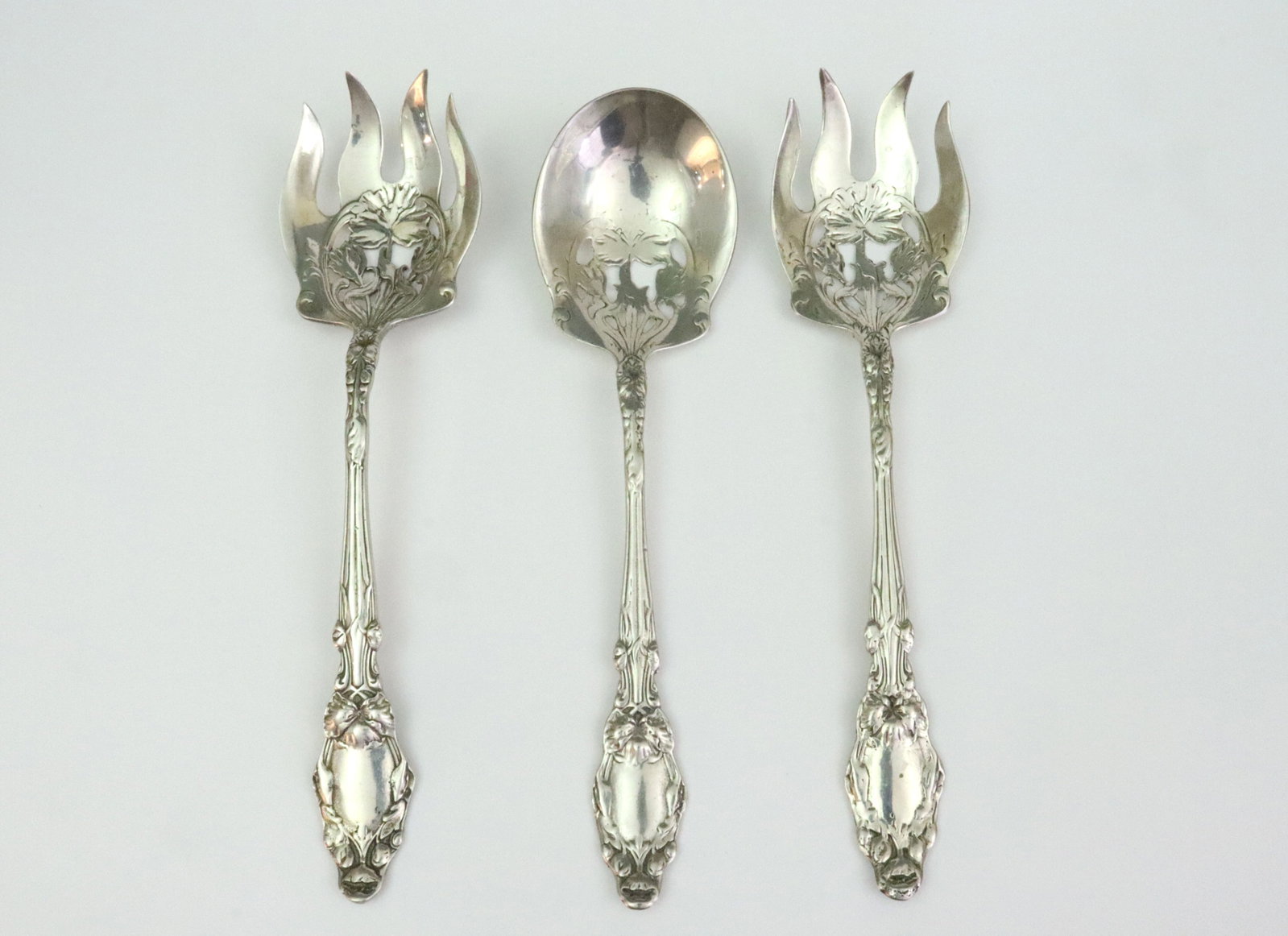 (3) STERLING SALAD SERVING UTENSILS: including 2 salad forks (9.75in.) and a salad spoon (9.5in.), marked Sterling, 10.2ozt., Opening Bid $400