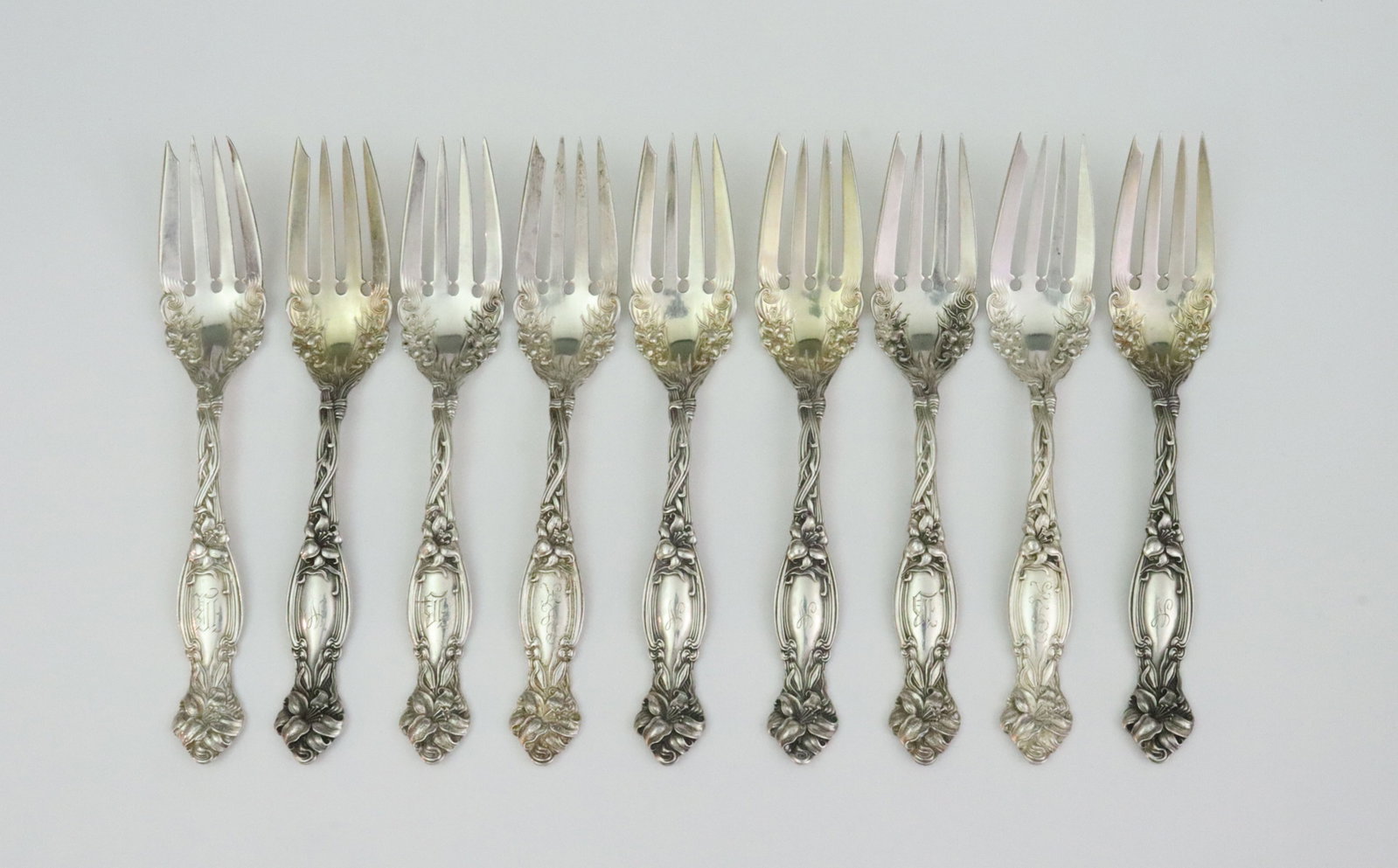 (9) INTERNATIONAL SILVER STERLING SALAD FORKS: in Frontenac pattern, 6.4in., monogrammed, 10.8ozt., Opening Bid $400