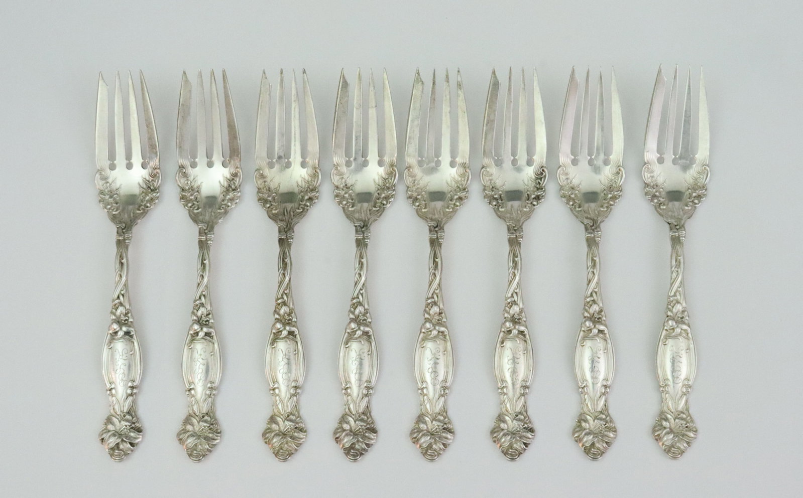 (8) INTERNATIONAL SILVER STERLING SALAD FORKS: in Frontenac pattern, 6.4in., monogrammed, 9.6ozt., Opening Bid $400