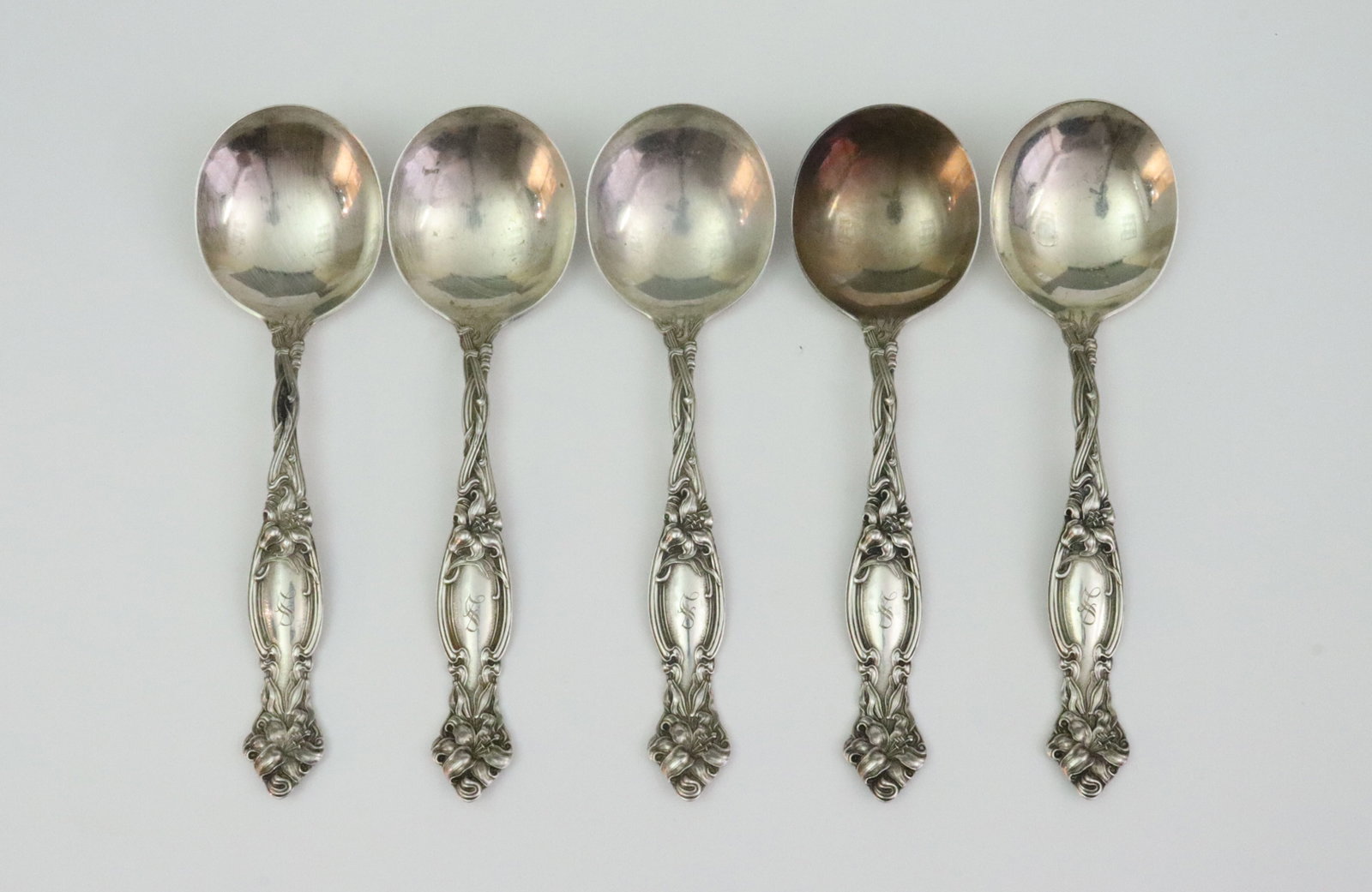 (5) INTERNATIONAL SILVER STERLING SOUP SPOONS: in Frontenac pattern, 6in., monogrammed, 7.3ozt., Opening Bid $300