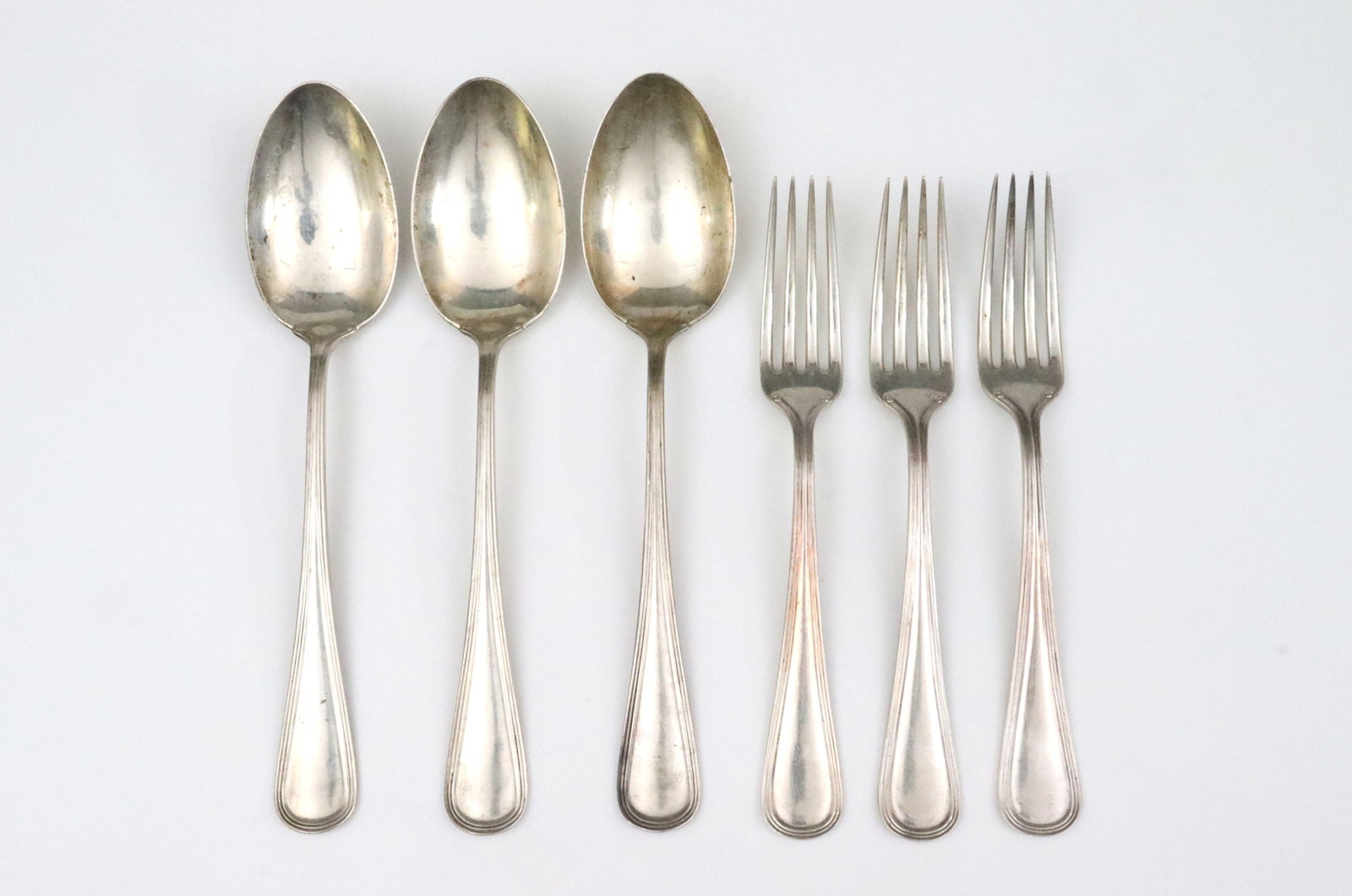 (17) PIECE WATSON STERLING FLATWARE GROUP: in Commonwealth pattern, including 11 place forks (7.25in.), and 6 tablespoons (8.5in.), no monograms, 33.7ozt., Opening Bid $900