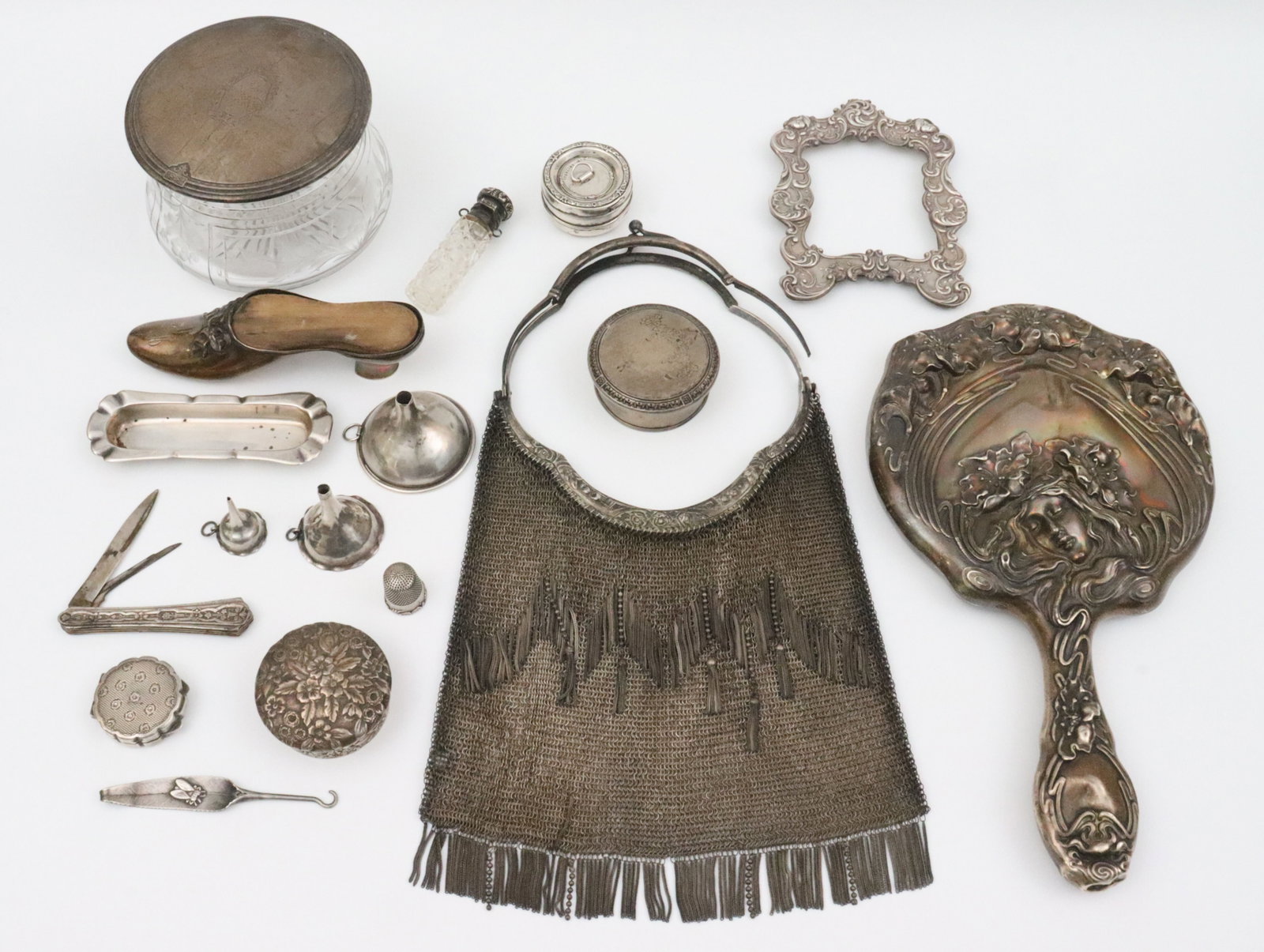 (17) PIECE SILVER VANITY GROUP: 800 silver includes a large deco German mesh purse, stamped 'Paten Geschutz Brevete 800' with crescent moon and crown mark, maker's mark MM within a heart (one handle separated from frame, minor drop