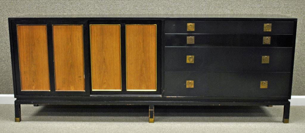 HARVEY PROBBER SIDEBOARD: in ebony finish, the right side comprising four graduated drawers, the left side with wood veneer panel sliders opening to a two-shelf, two-drawer interior, label of Harvey Probber, 30x77x18in. Condit