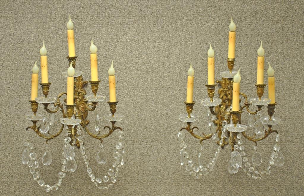 PAIR BRASS & CRYSTAL 6-LIGHT WALL SCONCES: 19th/20thC., hung with faceted almond drops and graduated beaded chains (replaced dishes lacking prisms), electrified, 20x15x15in.