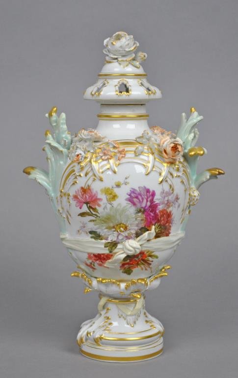 KPM PORCELAIN LIDDED POTPOURRI JAR: 19thC., hand painted florals and gilding, tied ribbon waist, KPM and blue sceptre mark, 13in., multiple floral chips and losses