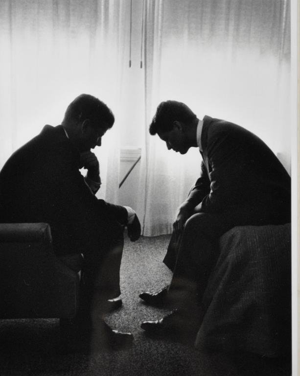 HANK WALKER ICONIC PHOTOGRAPH OF JF & RF KENNEDY: at the1960 Democratic Convention, Hotel Baltimore, Los Angeles, signed by White House photographer Hank Walker, 12x9.5in.