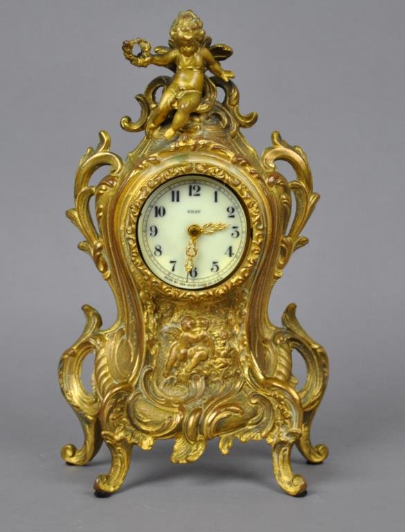 GILT METAL CHERUB CLOCK, NEW HAVEN CLOCK CO.