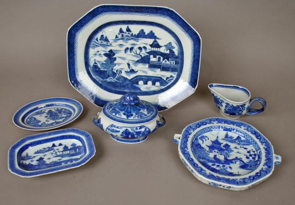(6) CHINESE EXPORT BLUE & WHITE SERVICE PIECES: 19thC., including a 15" octagonal platter (glaze flaw to edge), 2 small platters, a small tureen with cover, a warmer plate, and a Fitzhugh gravy, most with minor rubs and roughness