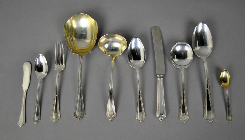 51-PIECE GORHAM PLYMOUTH STERLING FLATWARE SET: including 6 each place knives, place forks, soup spoons, tablespoons, butter spreaders, and demitasse spoons with vermeil bowls, 10 teaspoons, 3 serving spoons, a gravy ladle and a casserole spoon, mo